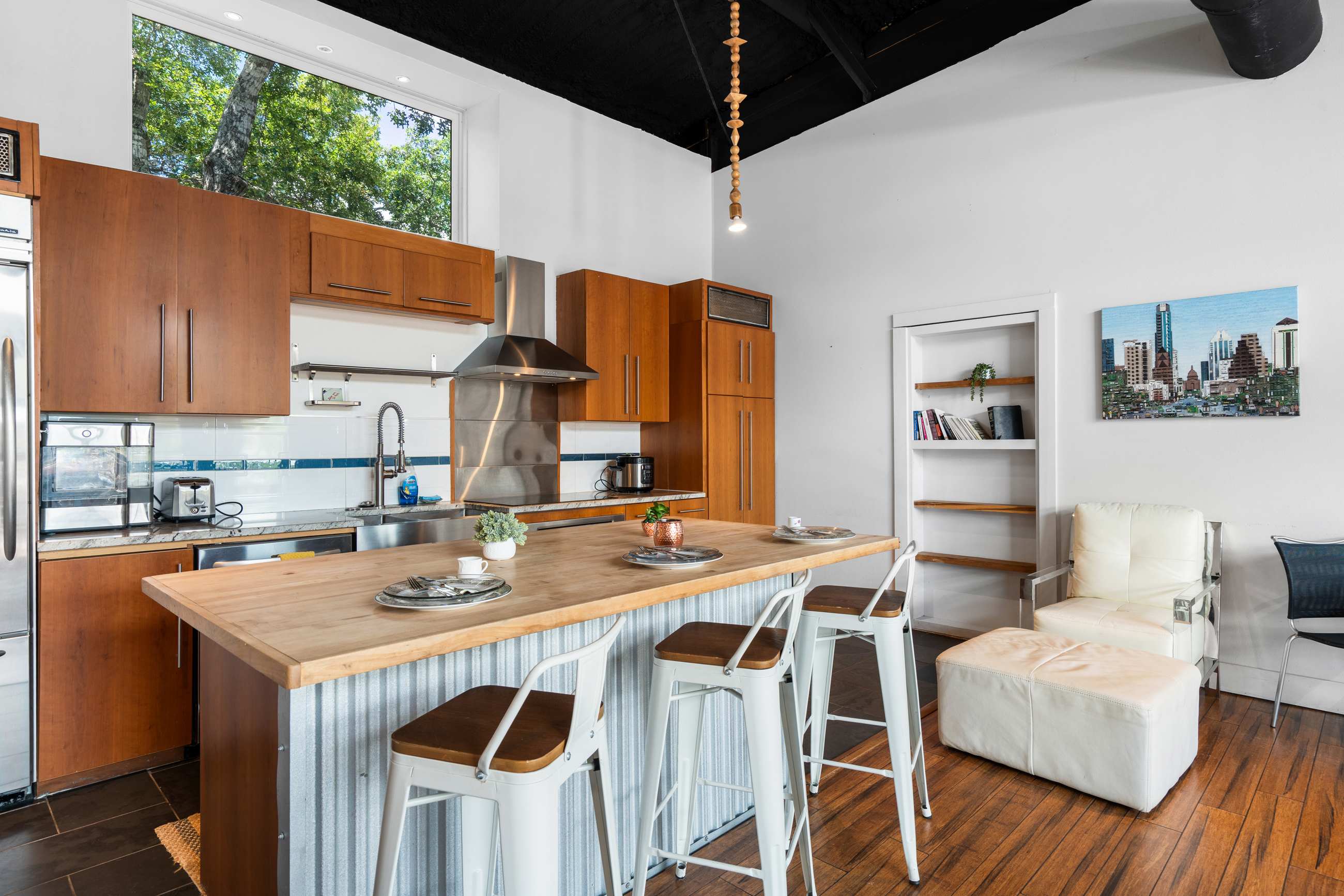 Modern Fully Equipped Kitchen with Island and Bar Stools