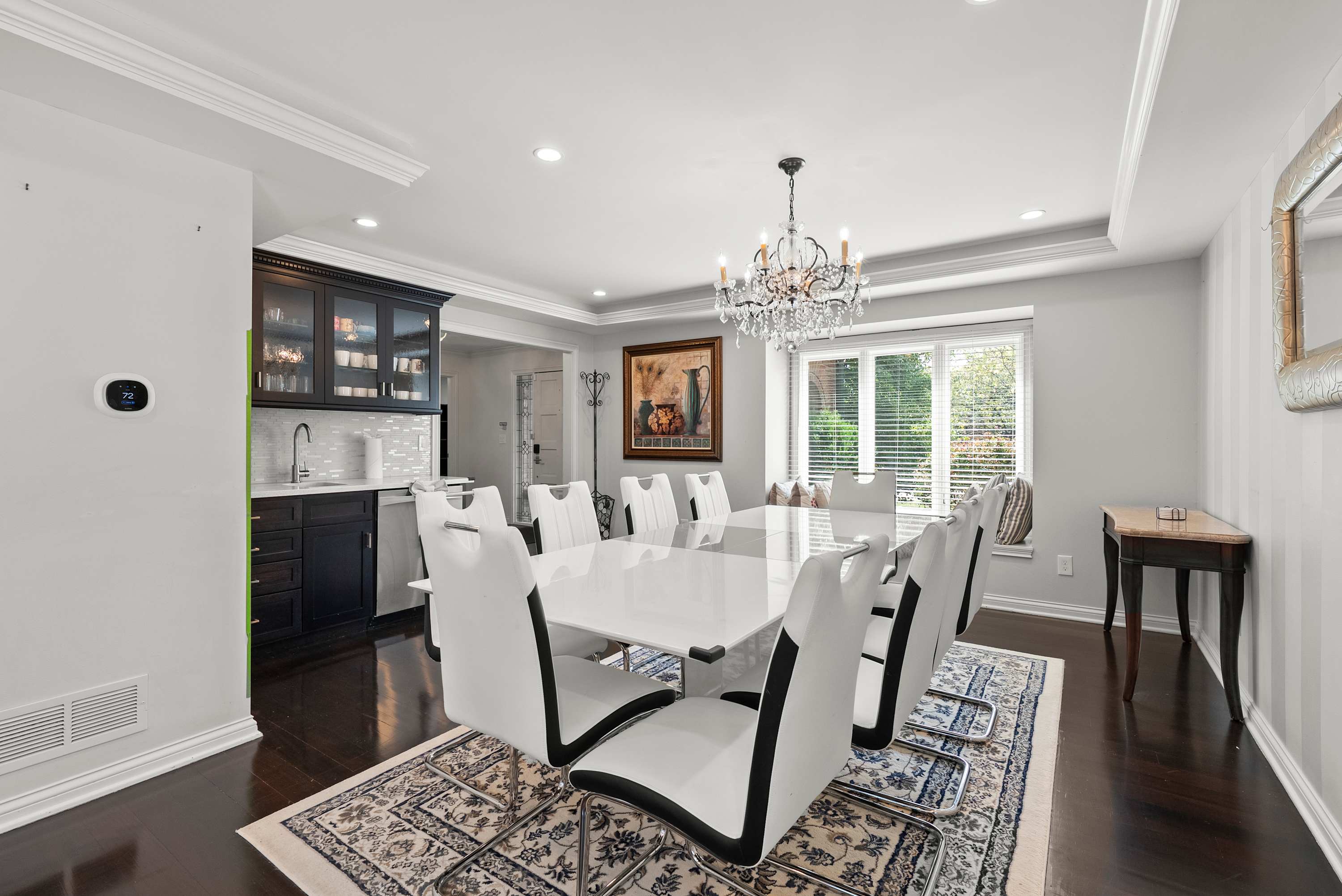Make mealtime memories together in the formal dining room, with space for 8​