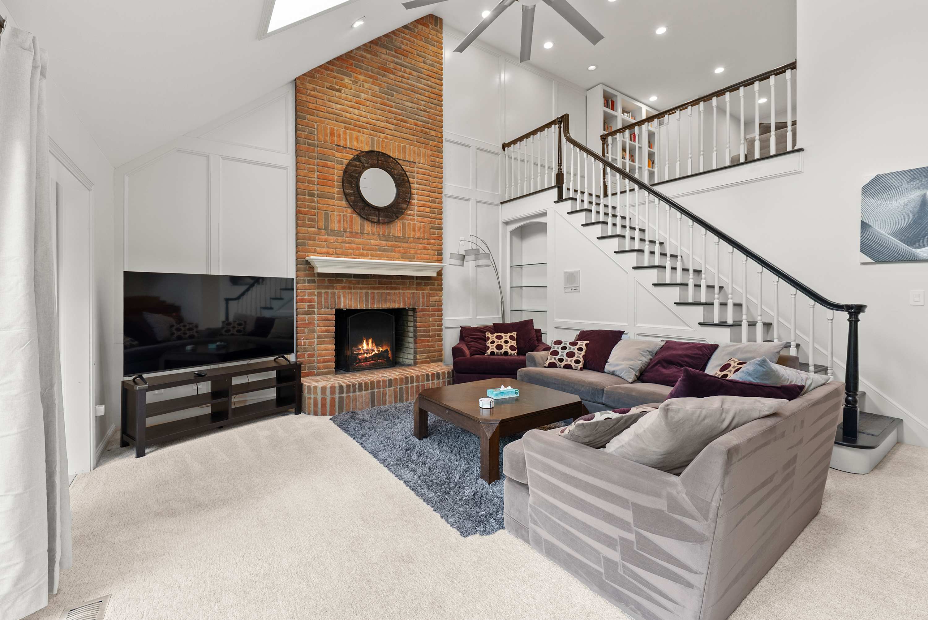 Curl up in the elegant living room & stream your favorites on the smart TV​