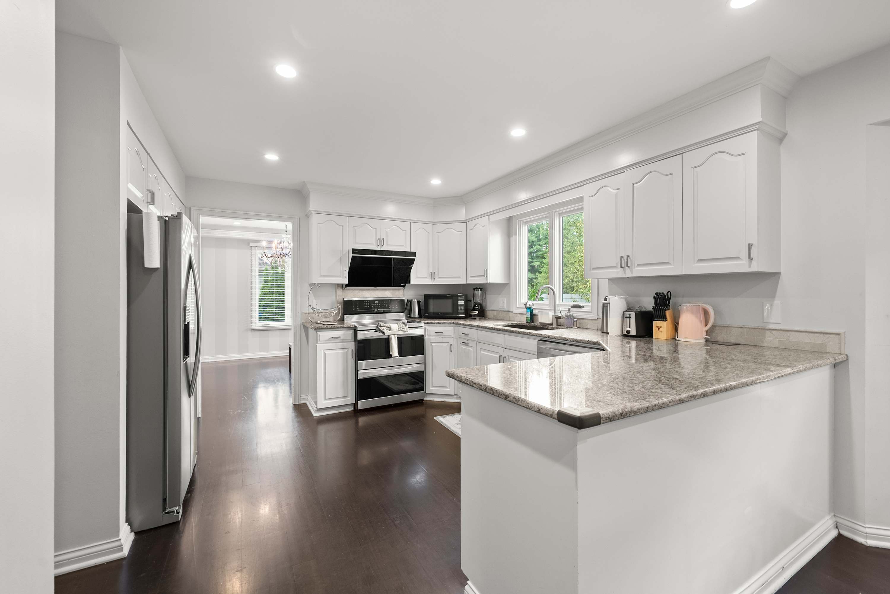 The open kitchen offers ample space & every home comfort​