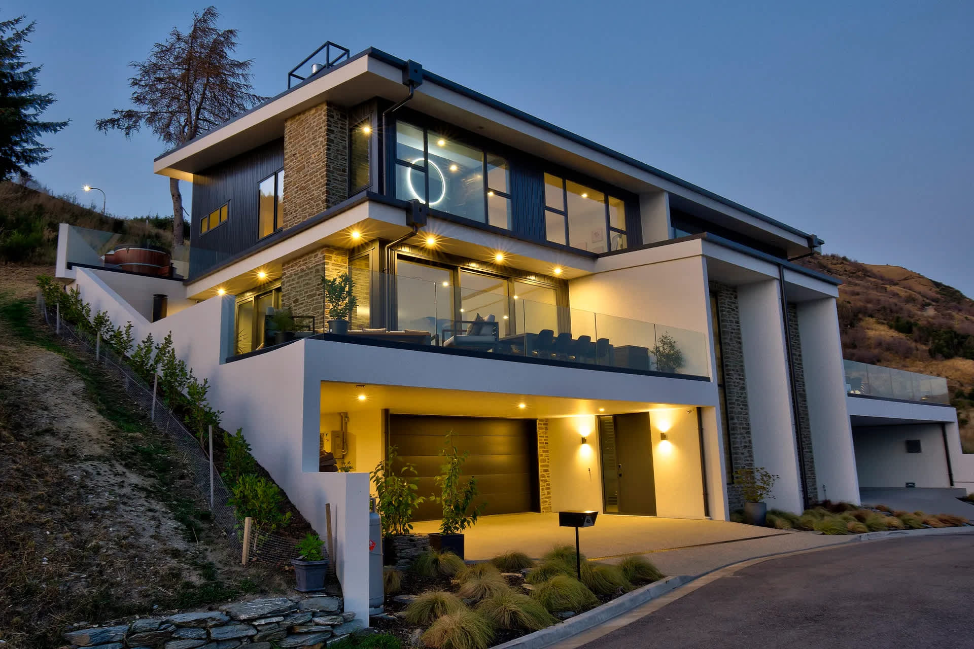 Modern Queenstown Hill villa exterior with panoramic lake and mountain views