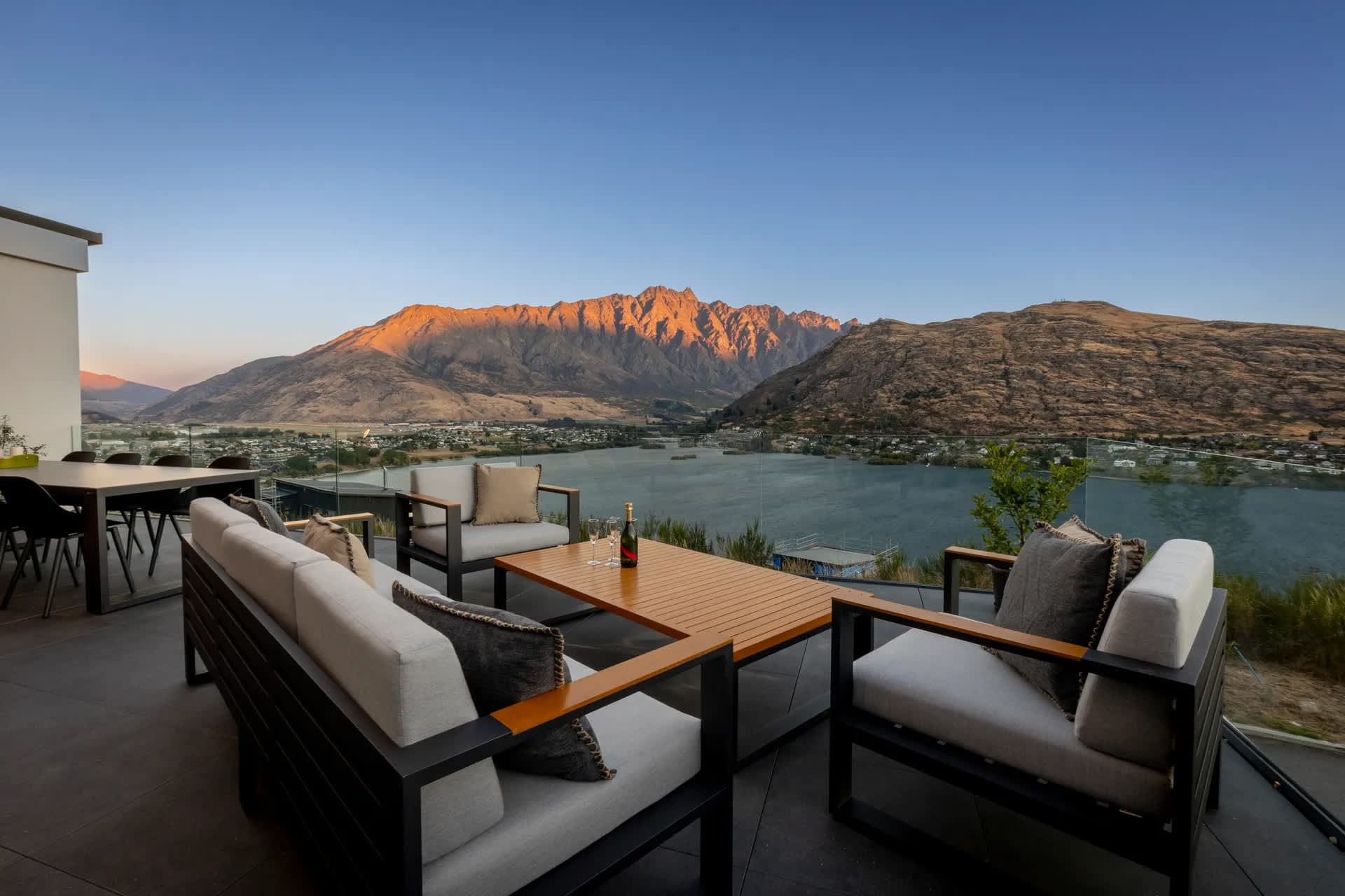 Modern Queenstown holiday home terrace with indoor–outdoor flow