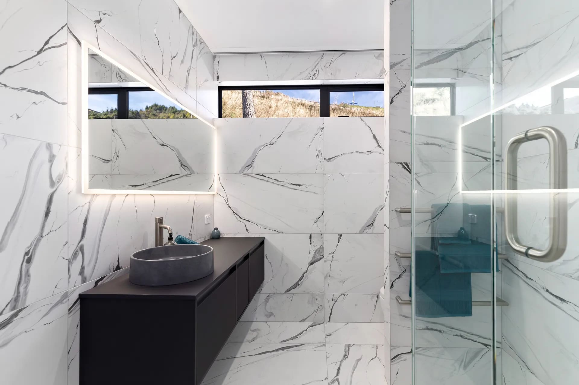 Modern Queenstown villa shared bathroom with tiled finishes and walk-in shower