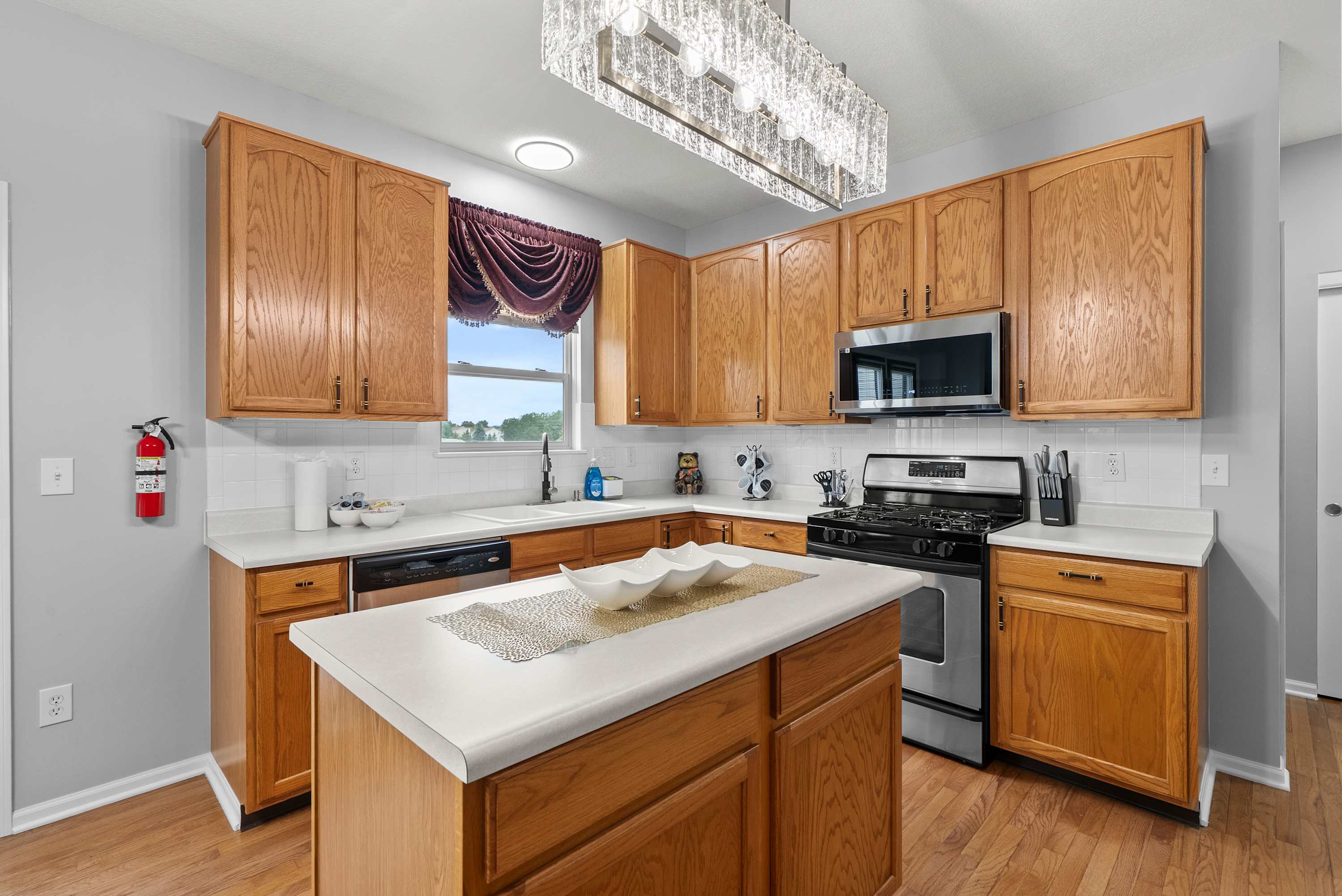 The airy kitchen offers ample space & all the comforts of home​