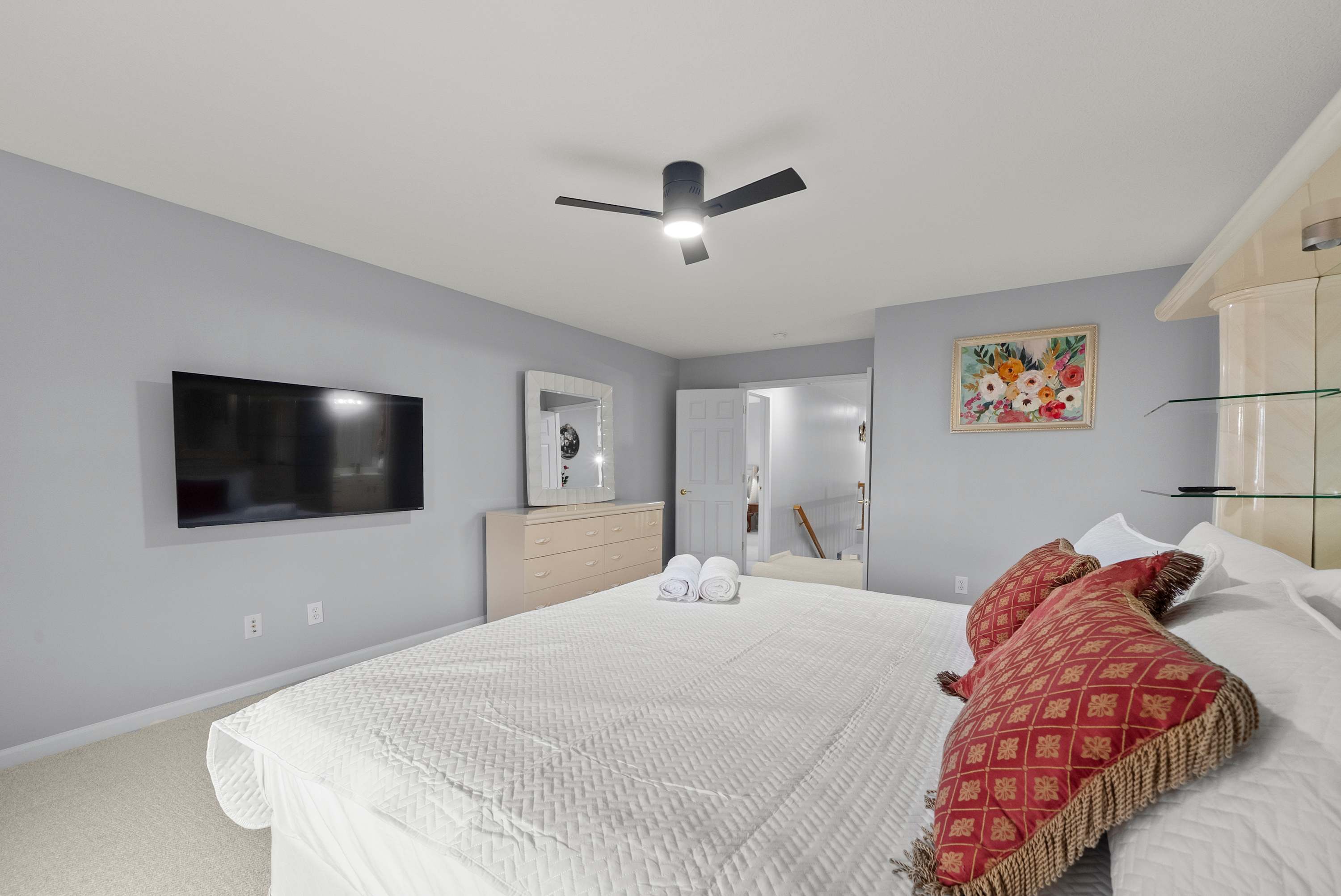 The primary king suite boasts a smart TV & ensuite bath​