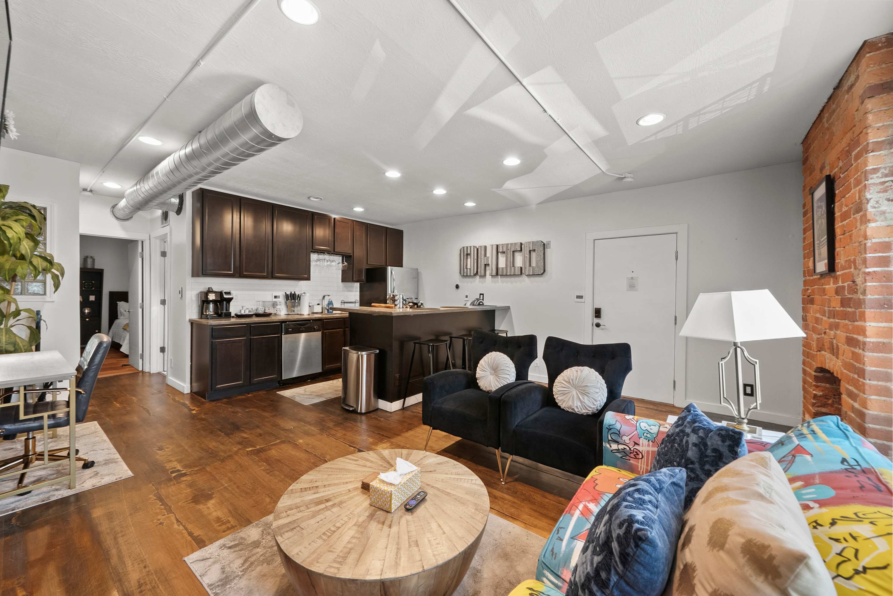 Curl up in the chic living room & stream your favorites on the smart TV​
