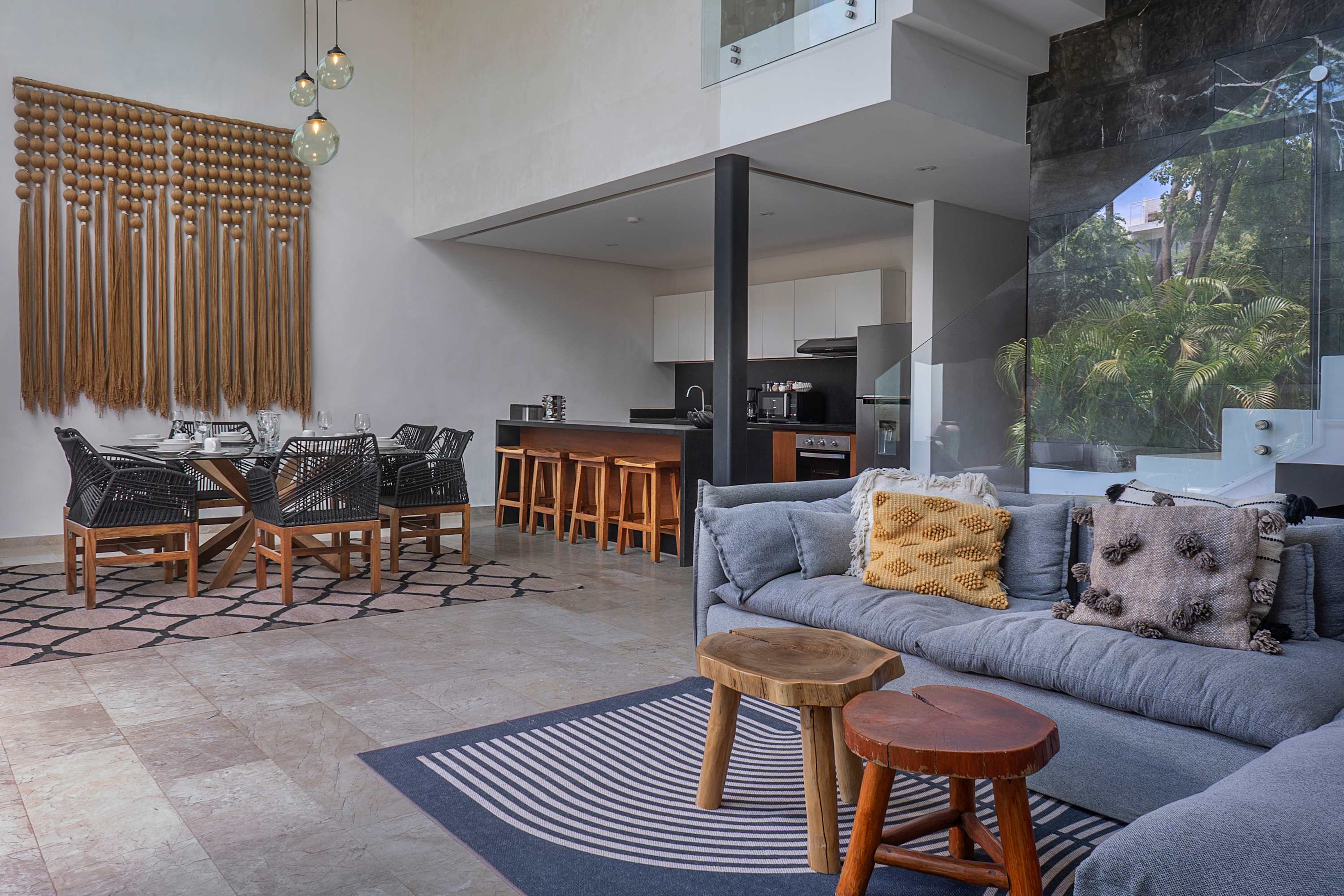 Ground floor in an open-concept space. Includes living room, kitchen, and dining room.