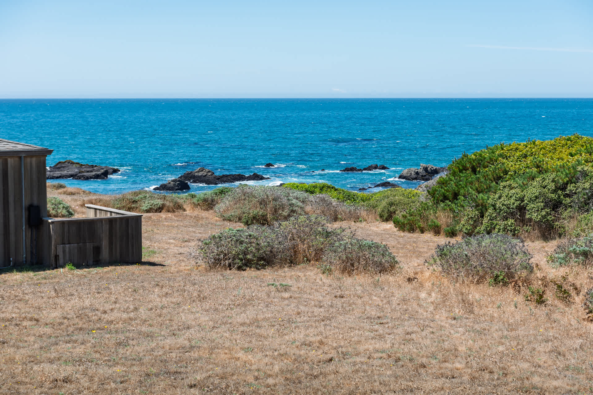 Unwind on the patio overlooking beautiful ocean views!