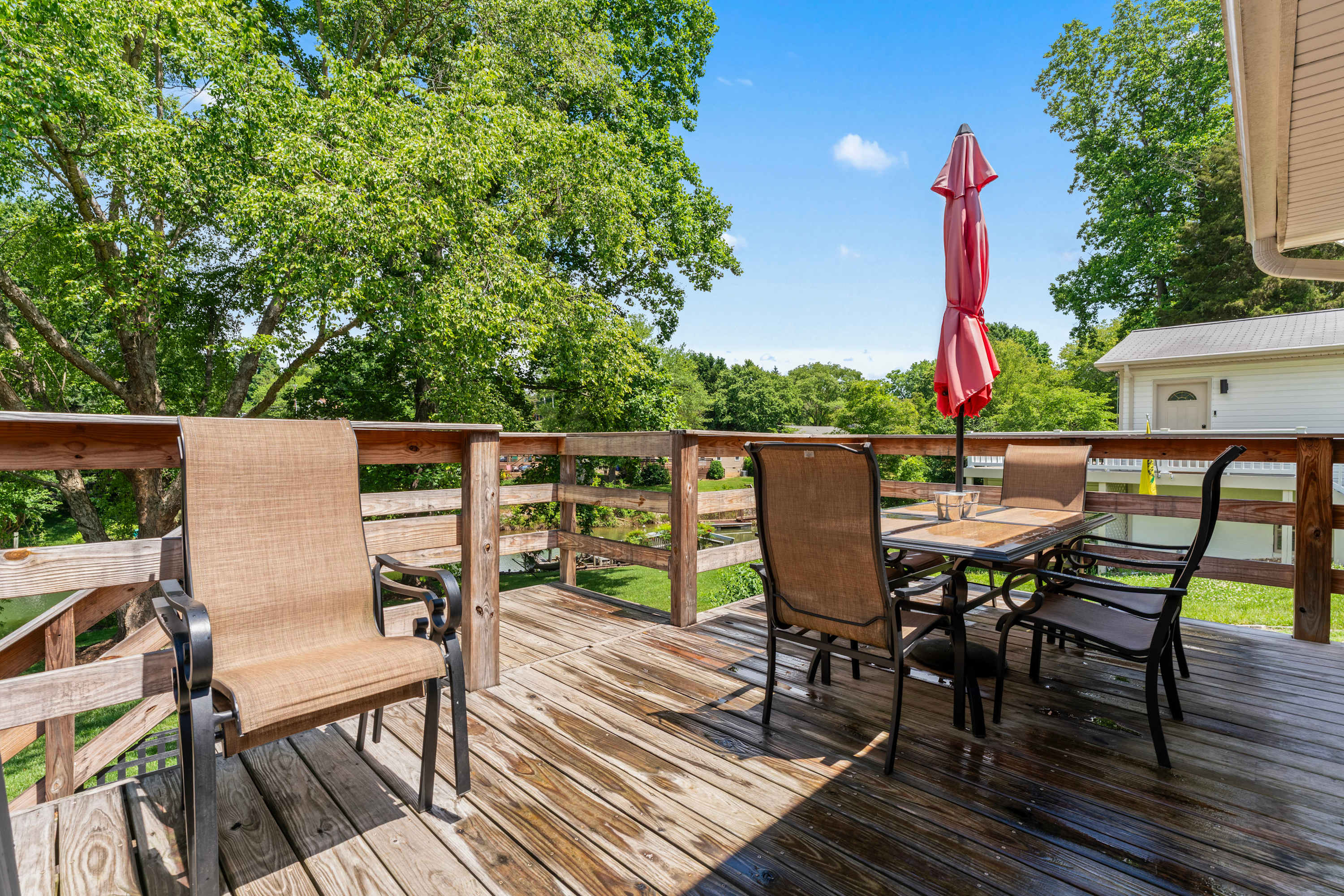 Savor meals on the back deck with beautiful lake views