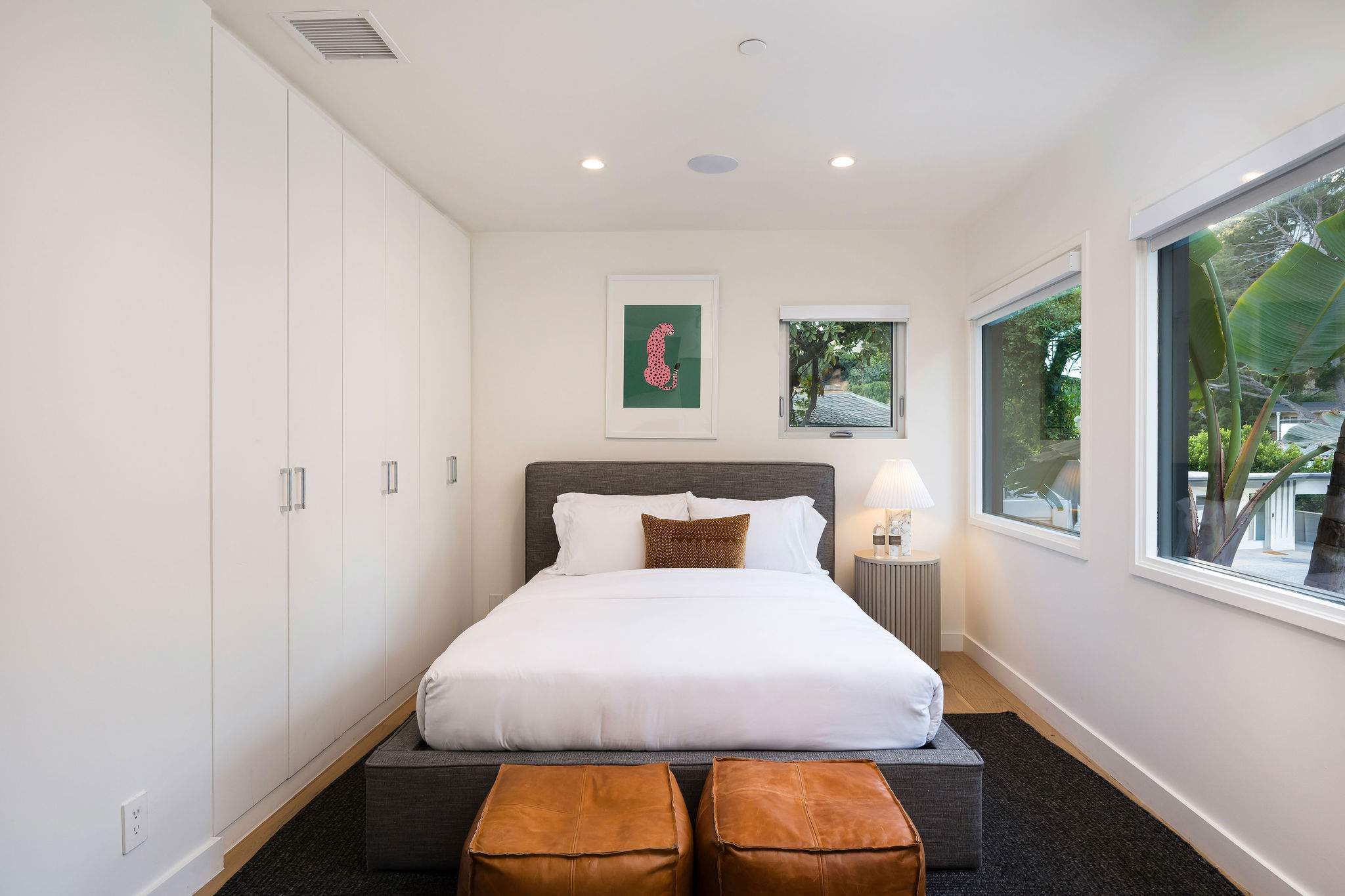 Guest bedroom #4 with a queen size bed, Smart TV and full bathroom.