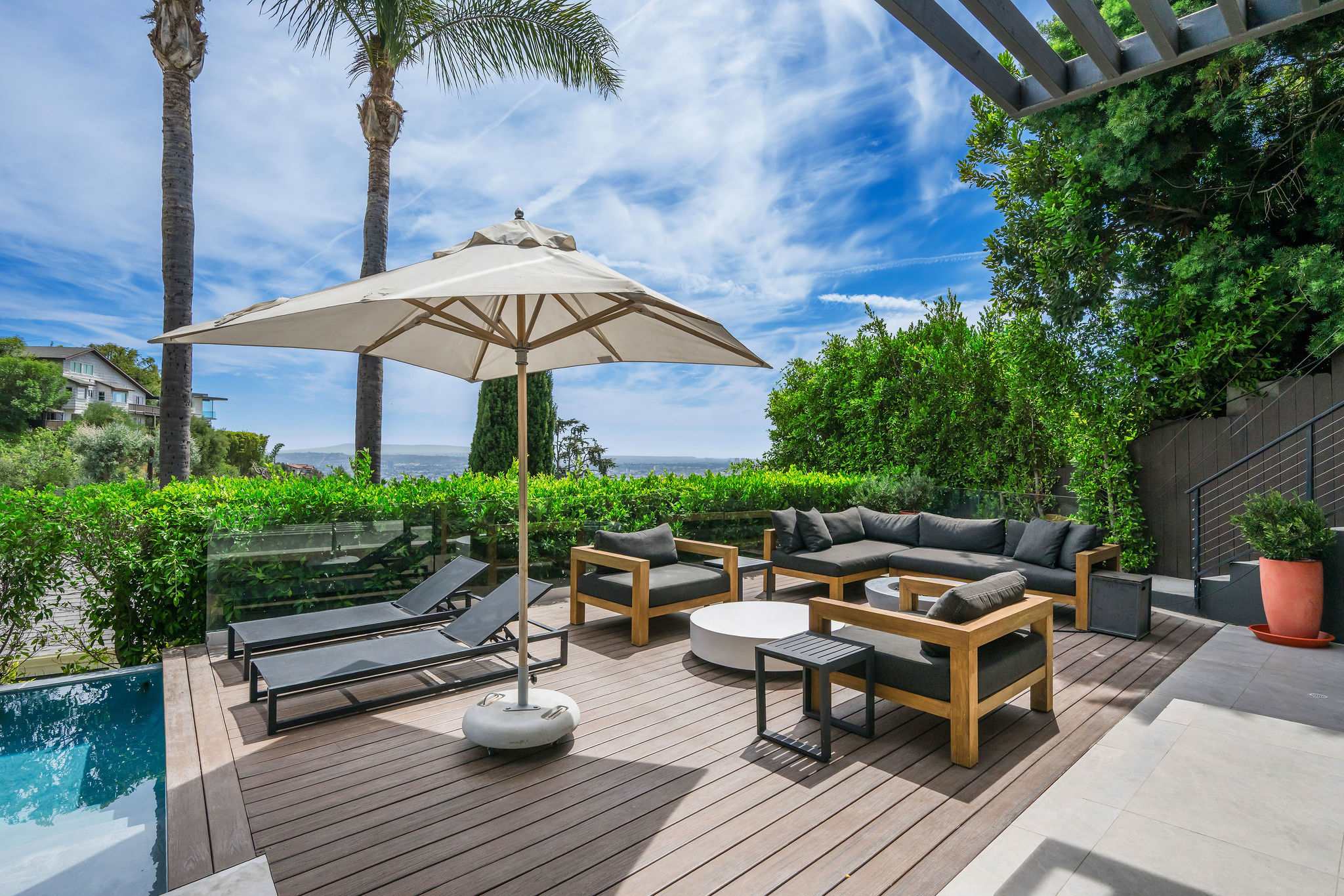 Outdoor lounge seating, fireplace, bbq and lots of sunshine!