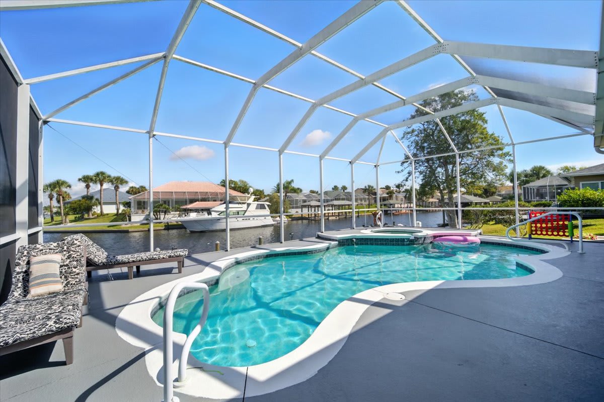Family Canal Retreat w/ Pool, Dock & Sunset Views 2