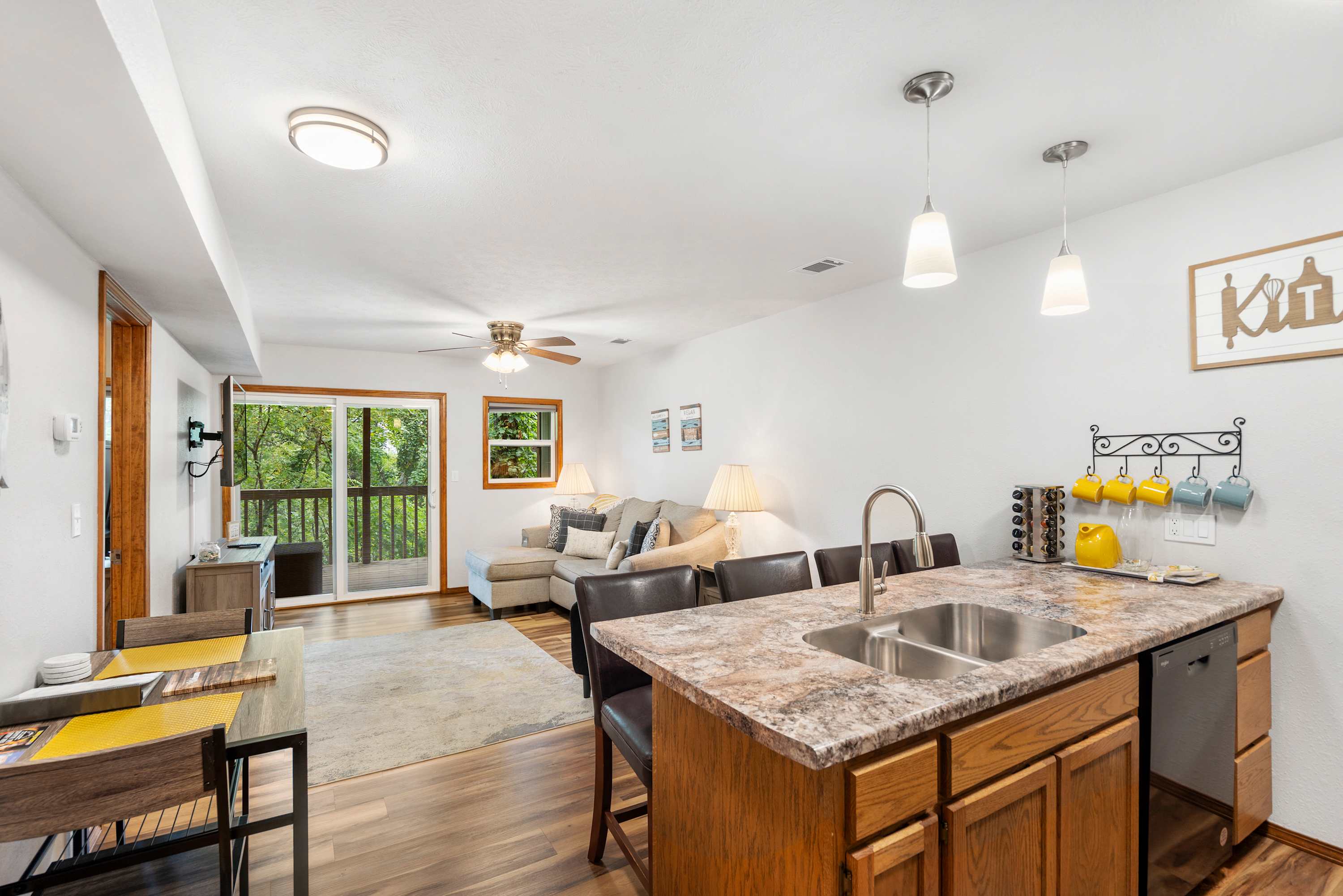 The open kitchen offers ample space & every home comfort