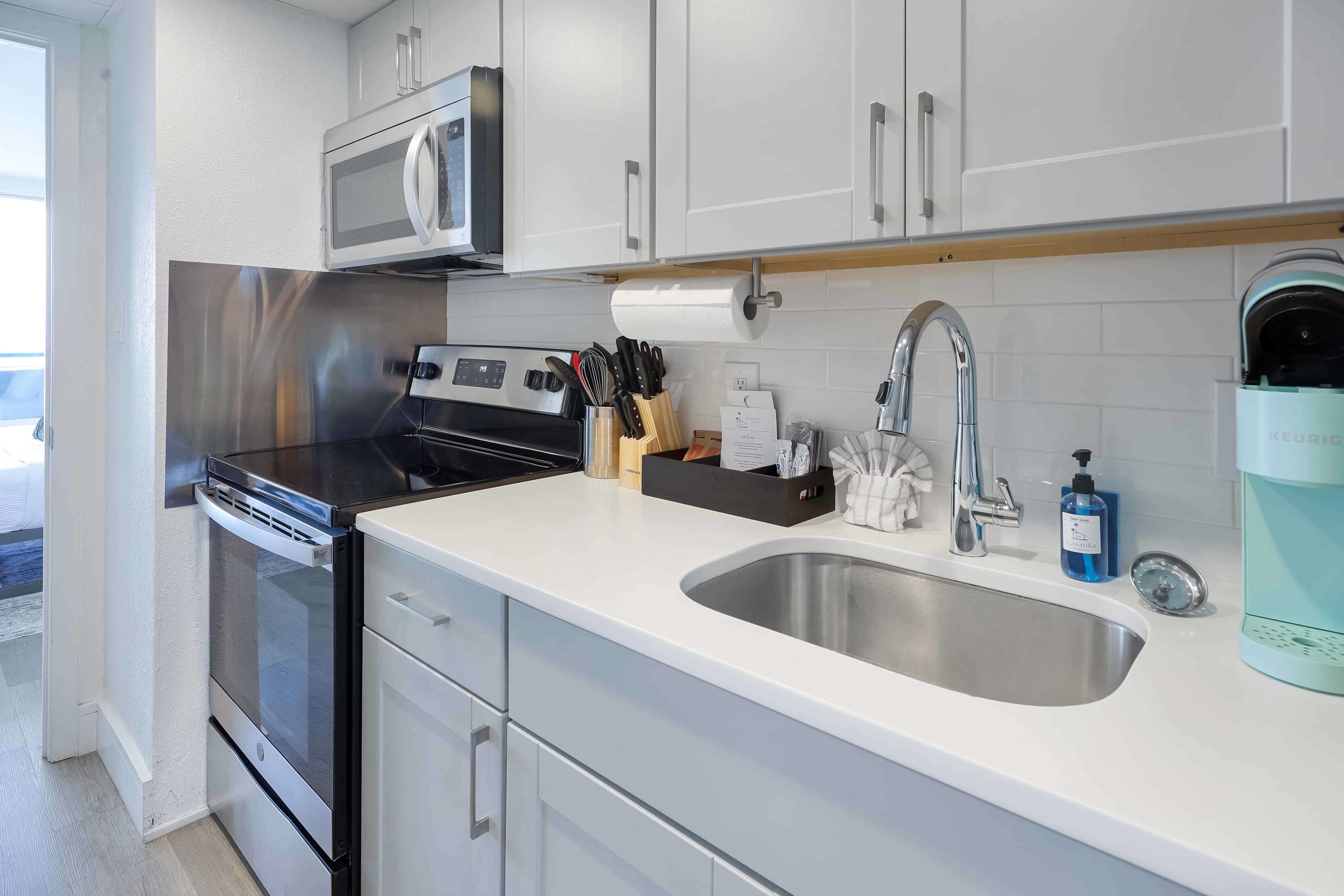 Modern kitchen with stainless steel appliances, perfect for cooking up a storm. 