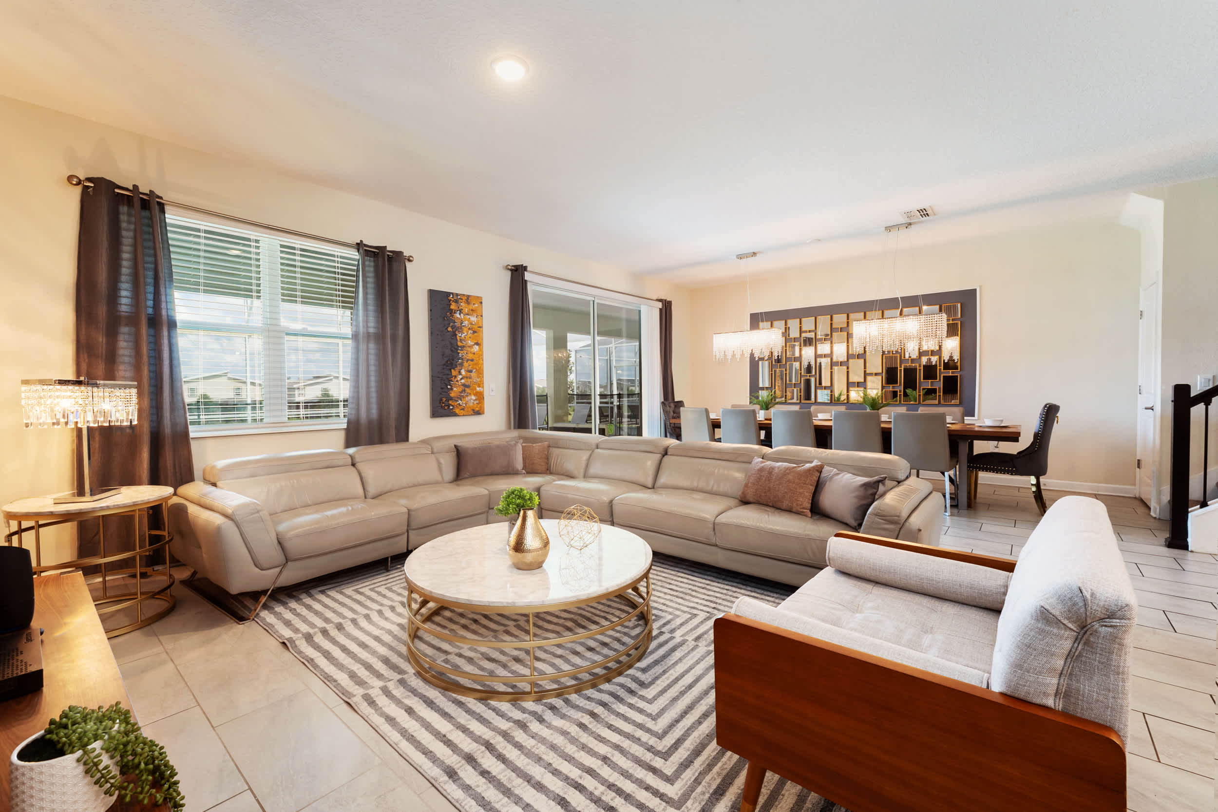 Luxurious living and dining area with elegant decor, perfect for entertaining and relaxation.