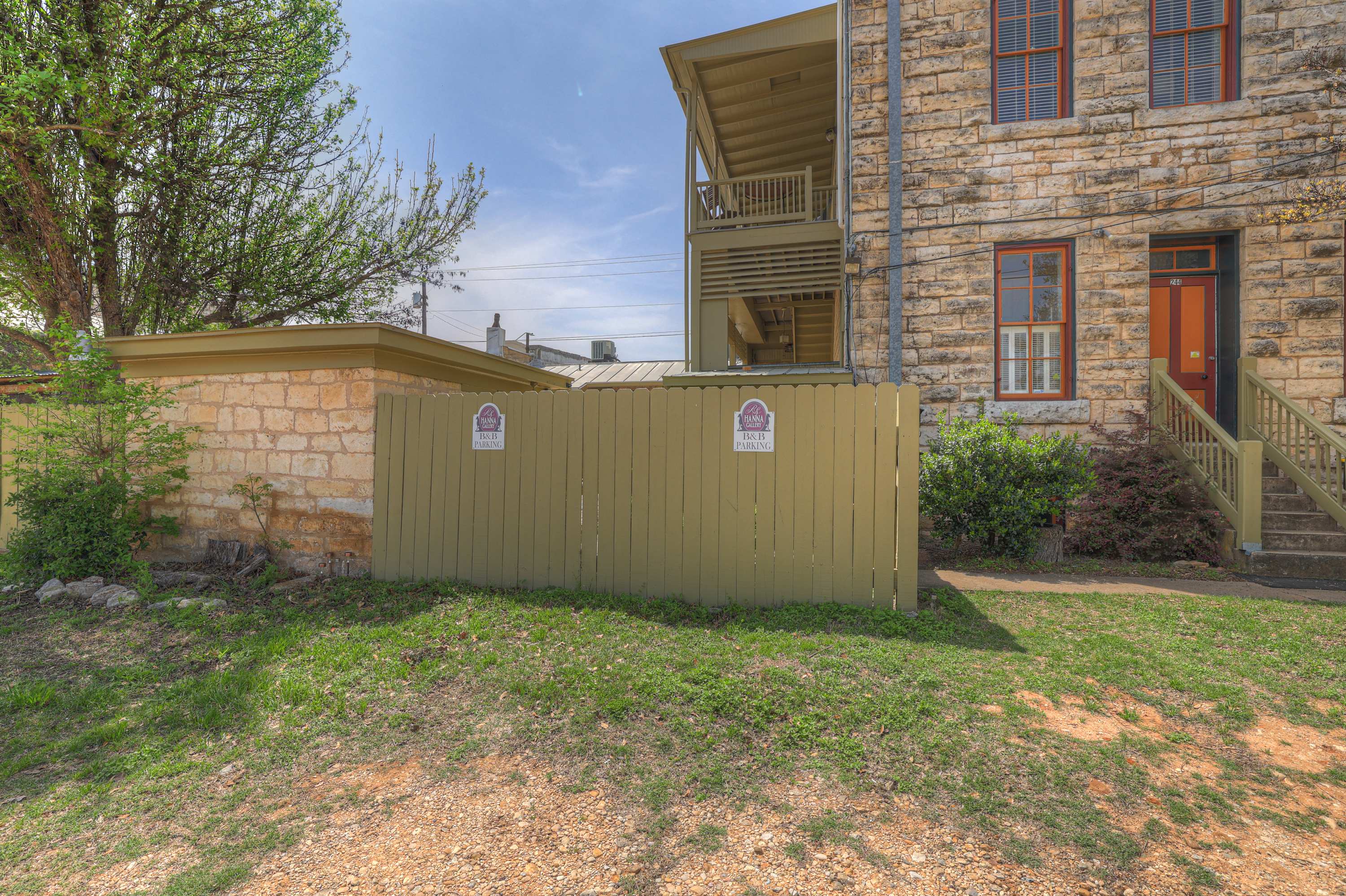 Parking is behind the RS Hanna Gallery on Main Street. Two Cars, additional parking on Main Street