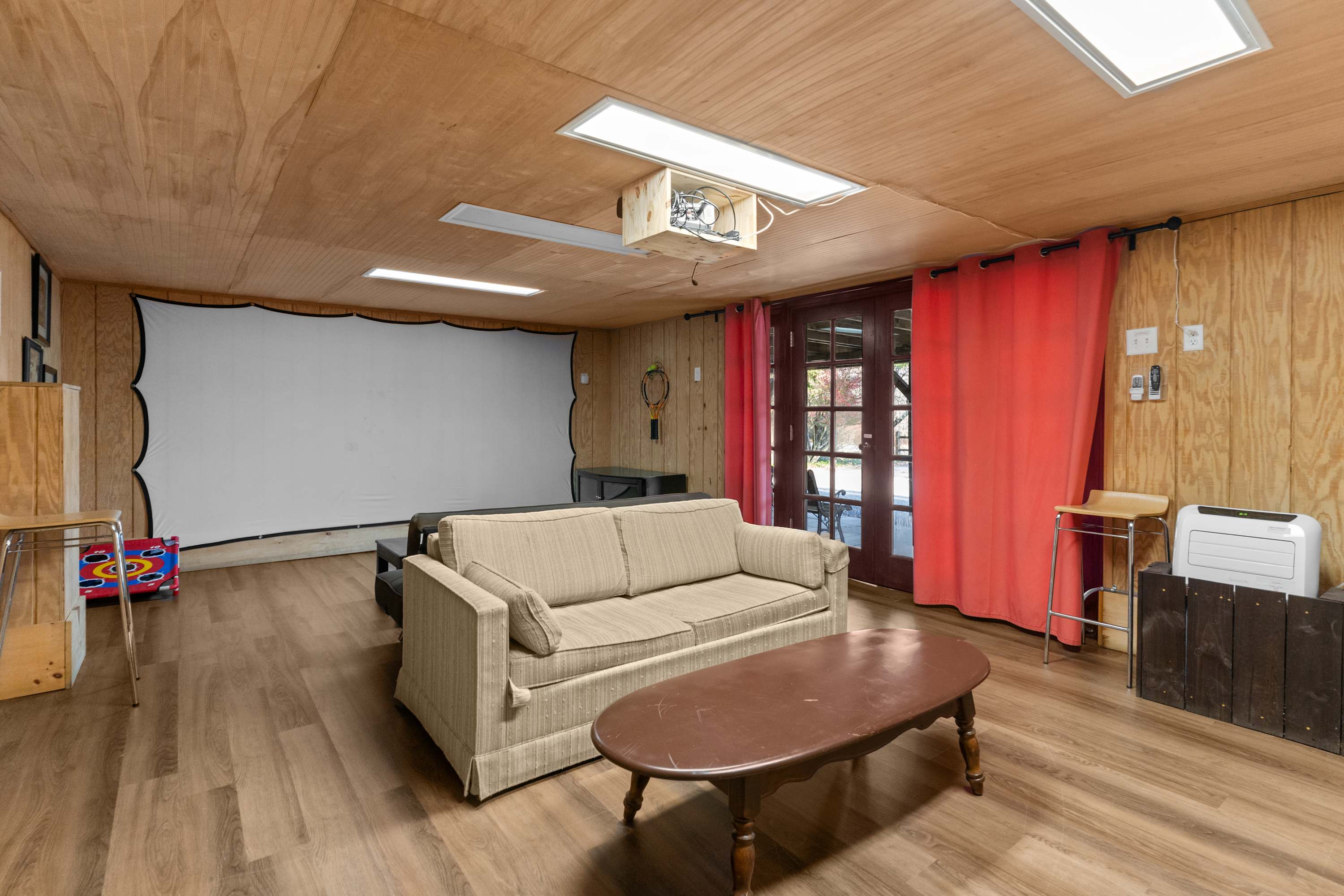 A cinematic feel in the theater room with space for the whole crew.