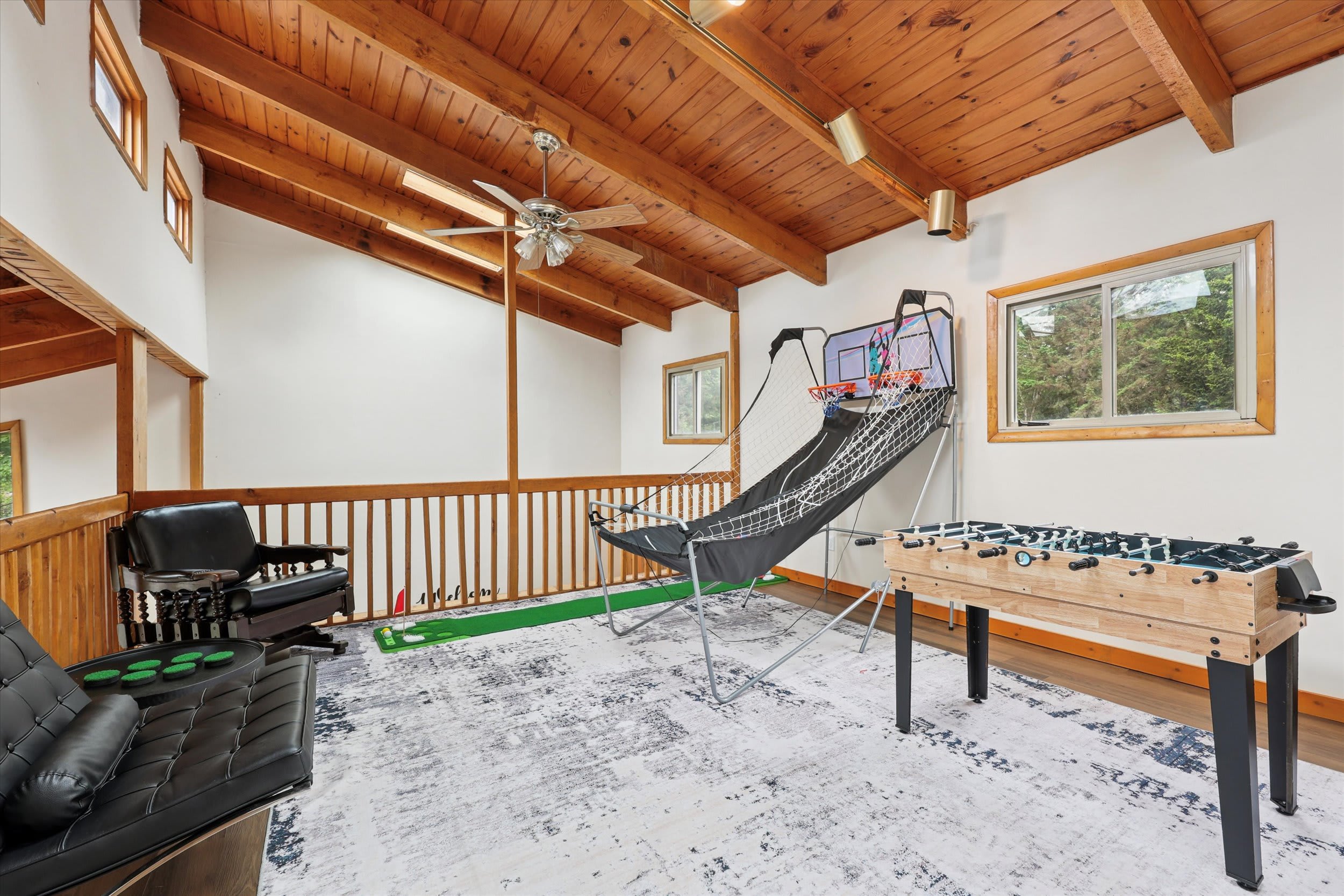 Challenge everyone to a round of arcade hoops, foosball, or putting in the loft game area.