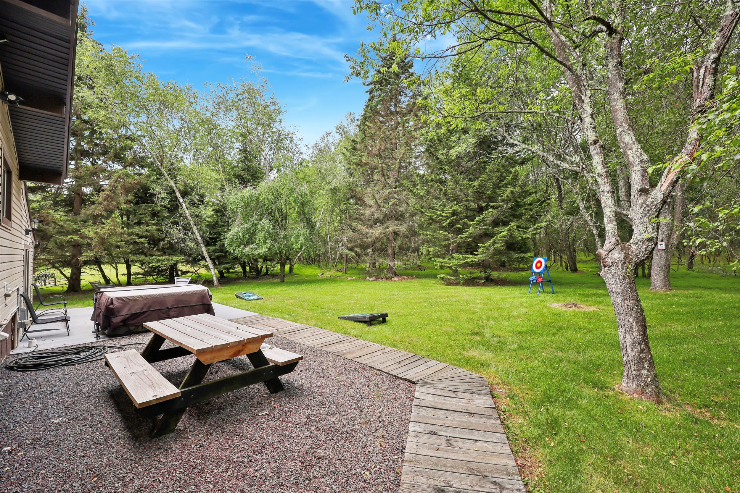 Gather around the picnic table in the private backyard for outdoor meals and memories.