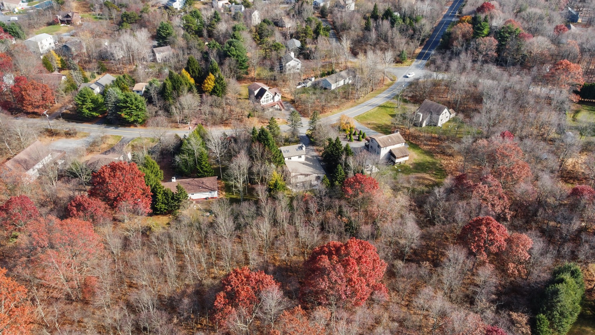 Fall colors surround the property in a stunning display of seasonal Poconos beauty.