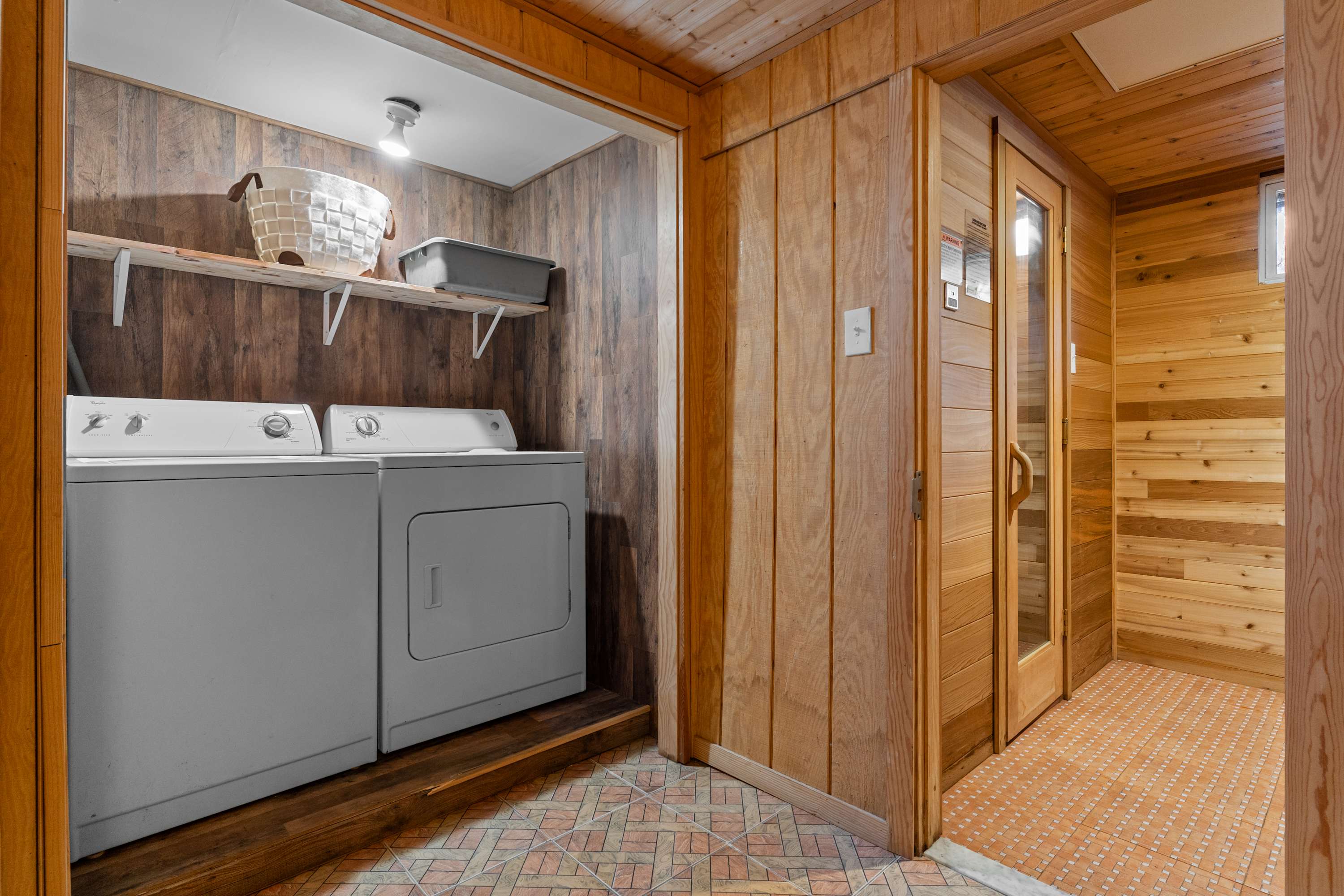 The laundry room sits conveniently next to the sauna so you can refresh after a relaxing session.
