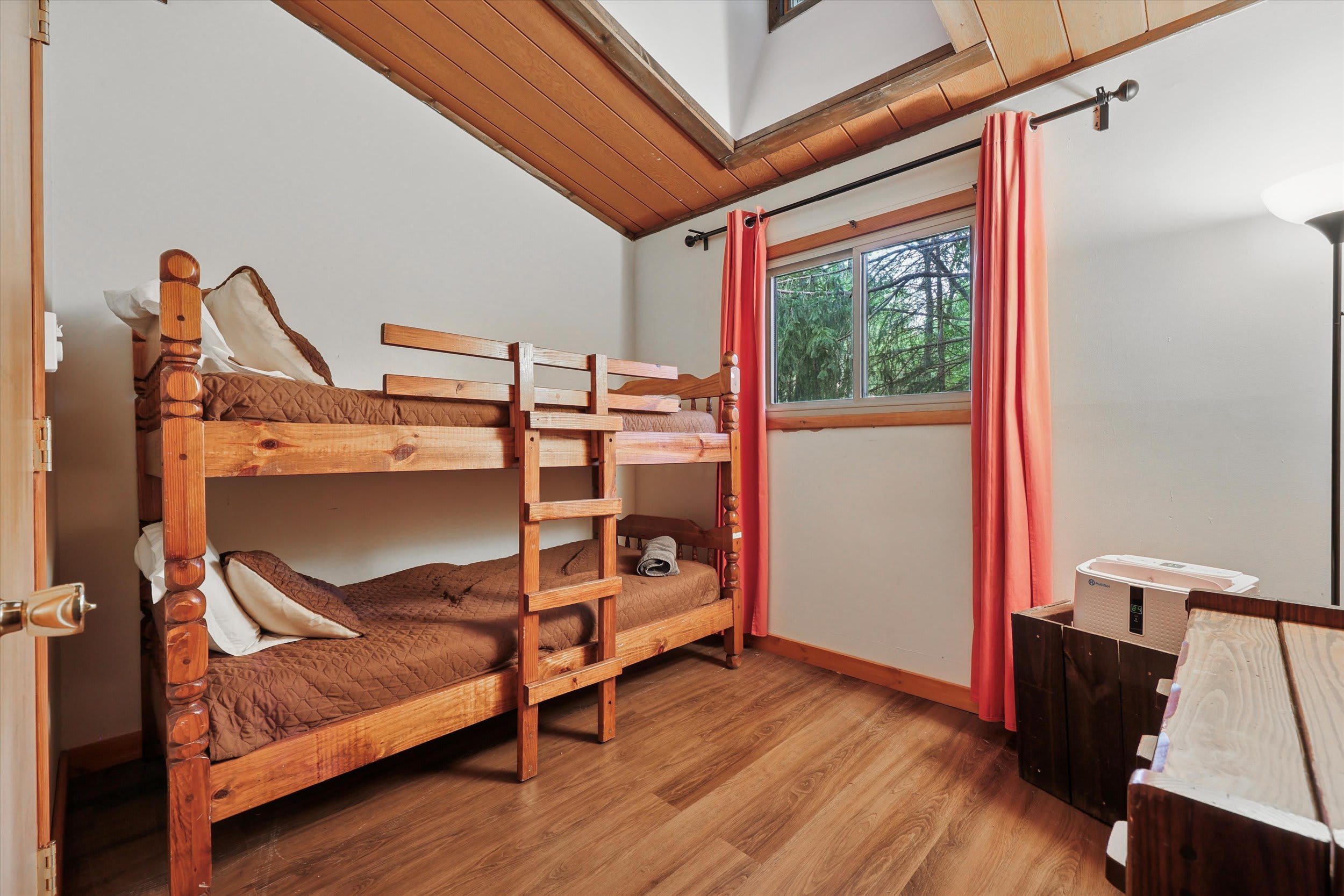 Kids will love the bunk bed room with views of the trees and room to play.