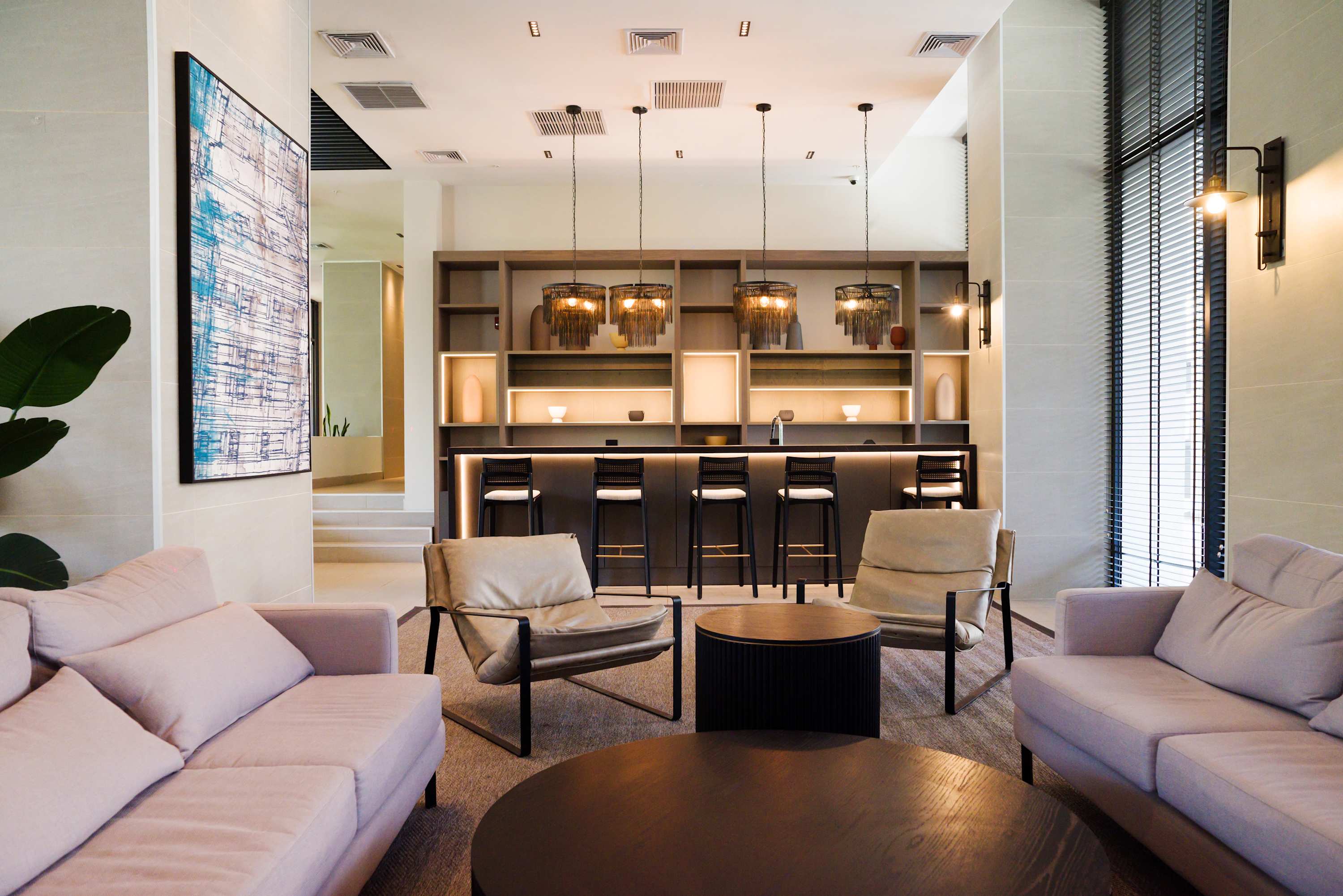 Relax in this stylish lounge with cozy seating and a chic bar area, perfect for unwinding after a day of exploring.