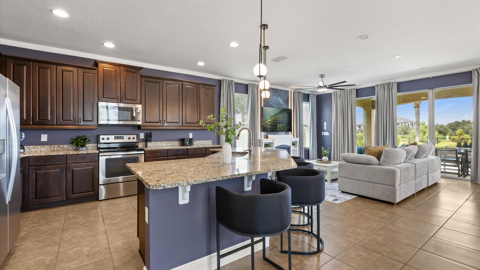 Modern kitchen with centred island and bar seating