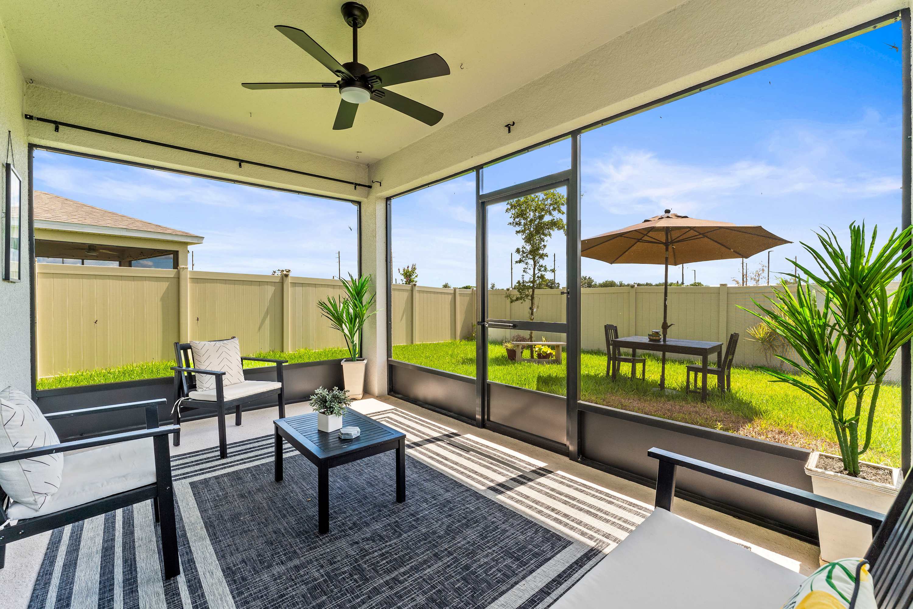 Enjoy the fresh air on the screened in patio