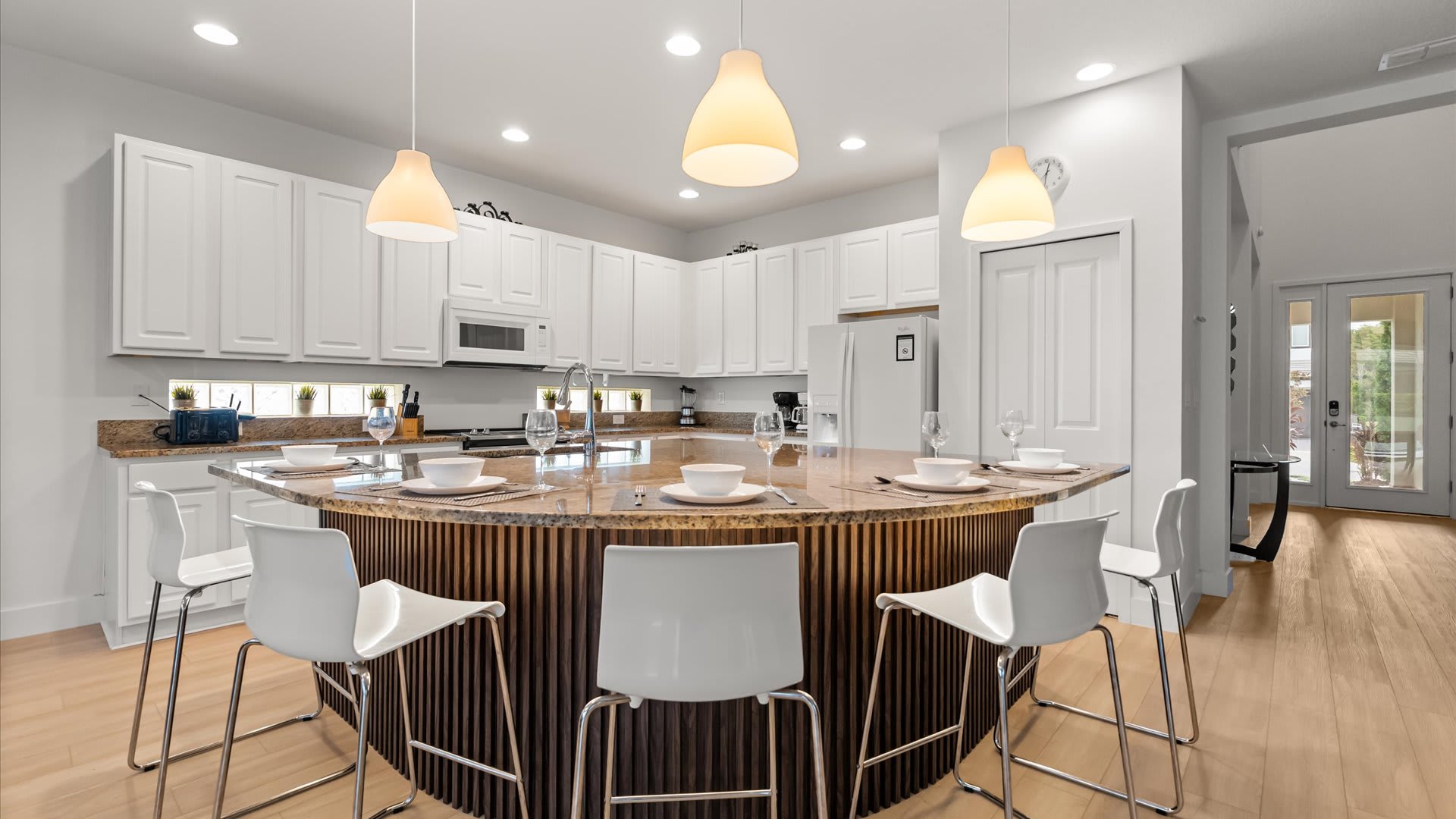 Contemporary kitchen with stylish centred island area