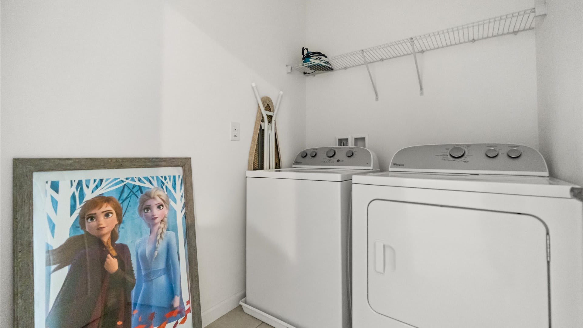 Convenient In-Home Laundry Room With Modern Washer And Dryer