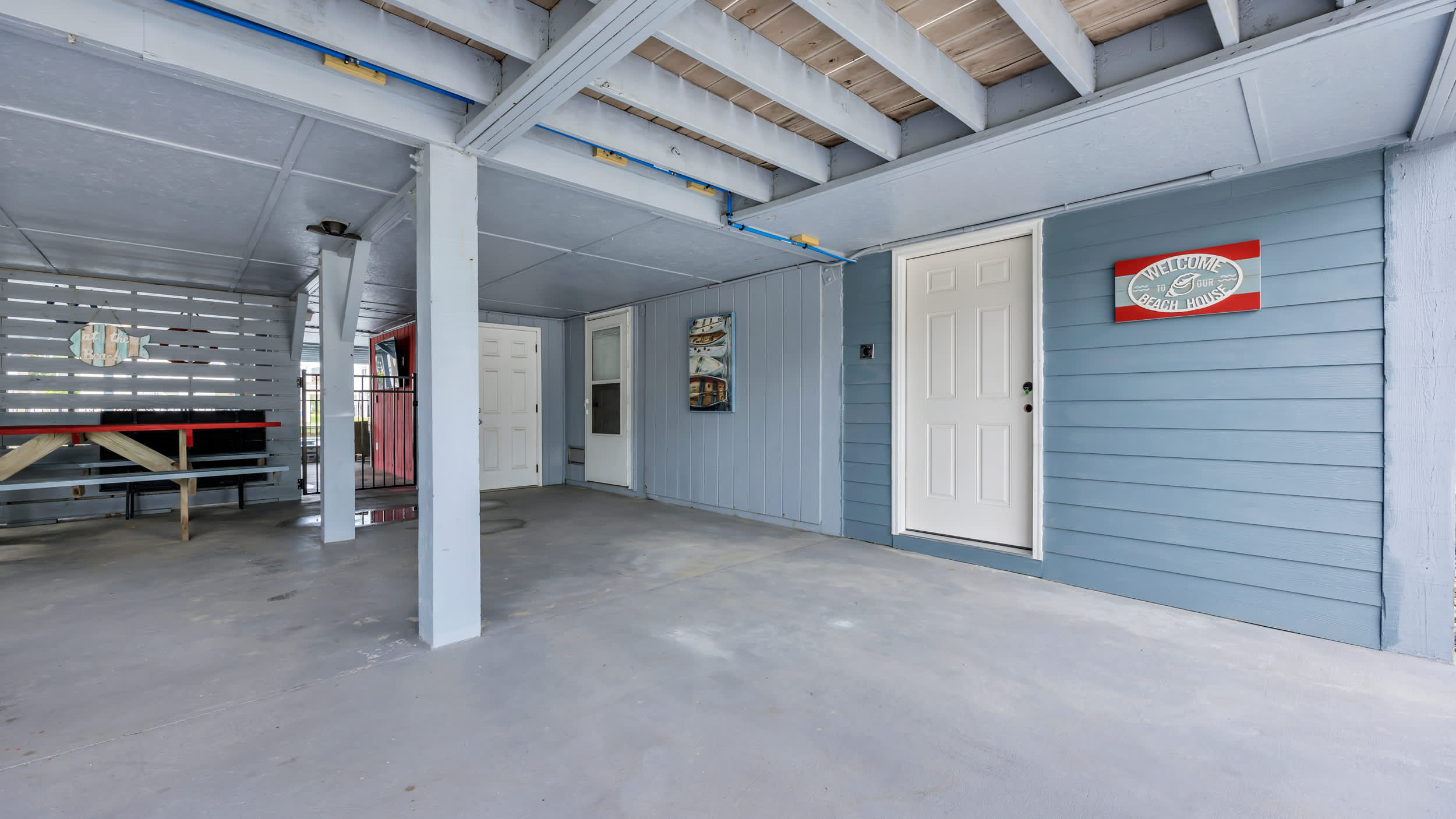 Covered Parking and Picnic Area Next to Pool and Cabana
