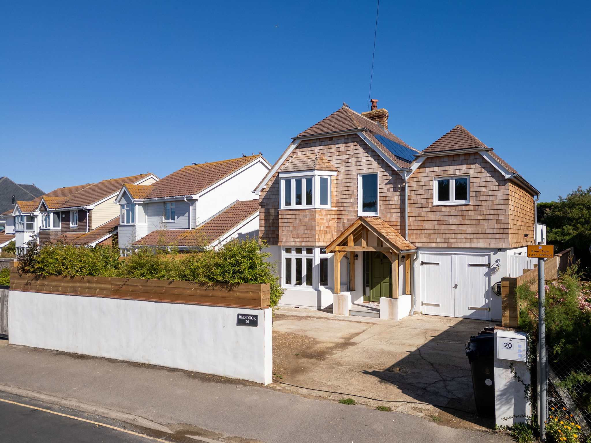 Beautifully renovated beachside retreat, with convenient driveway parking for up to four cars.