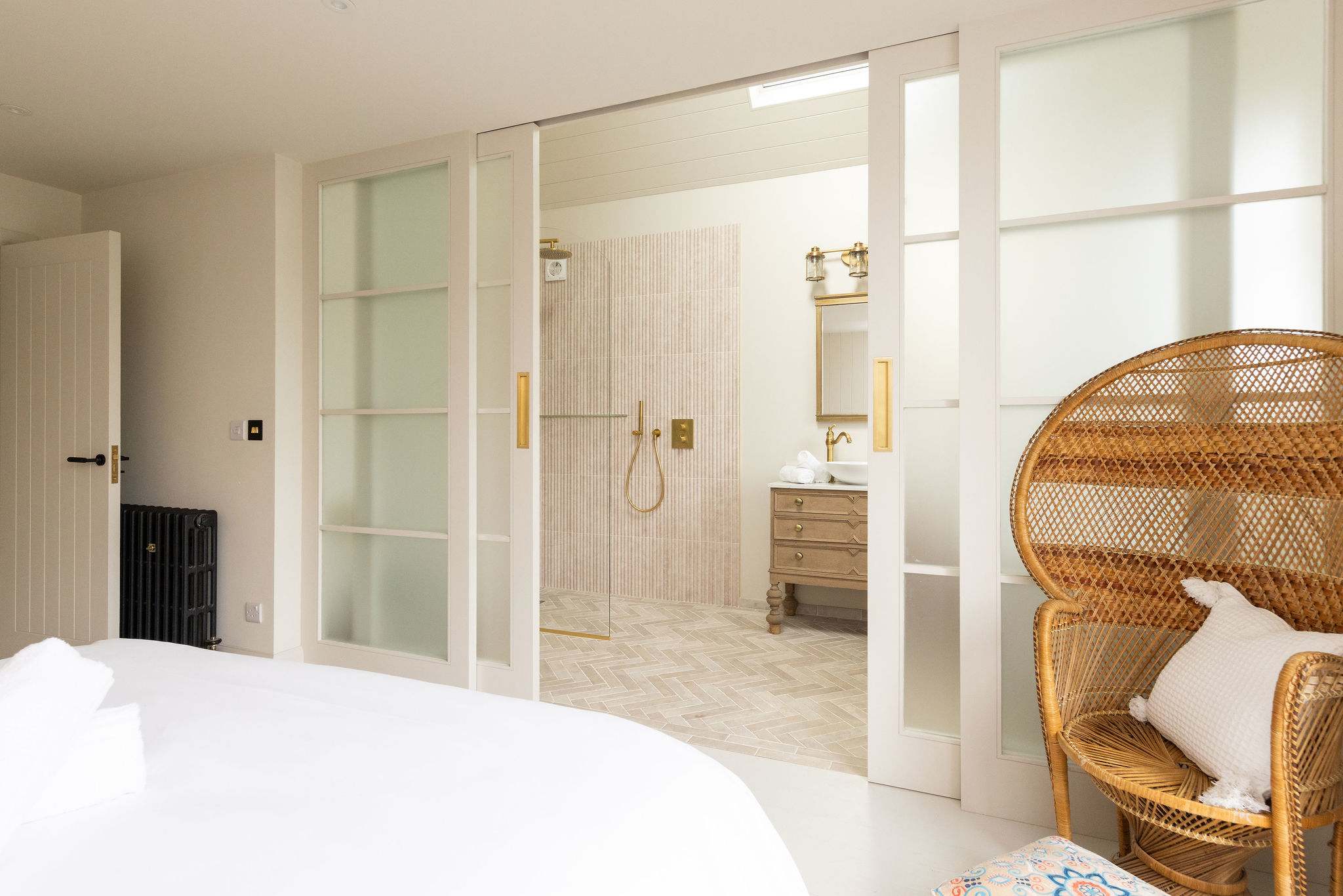 Your private sanctuary, where the bedroom opens into a stunning walk-in shower.