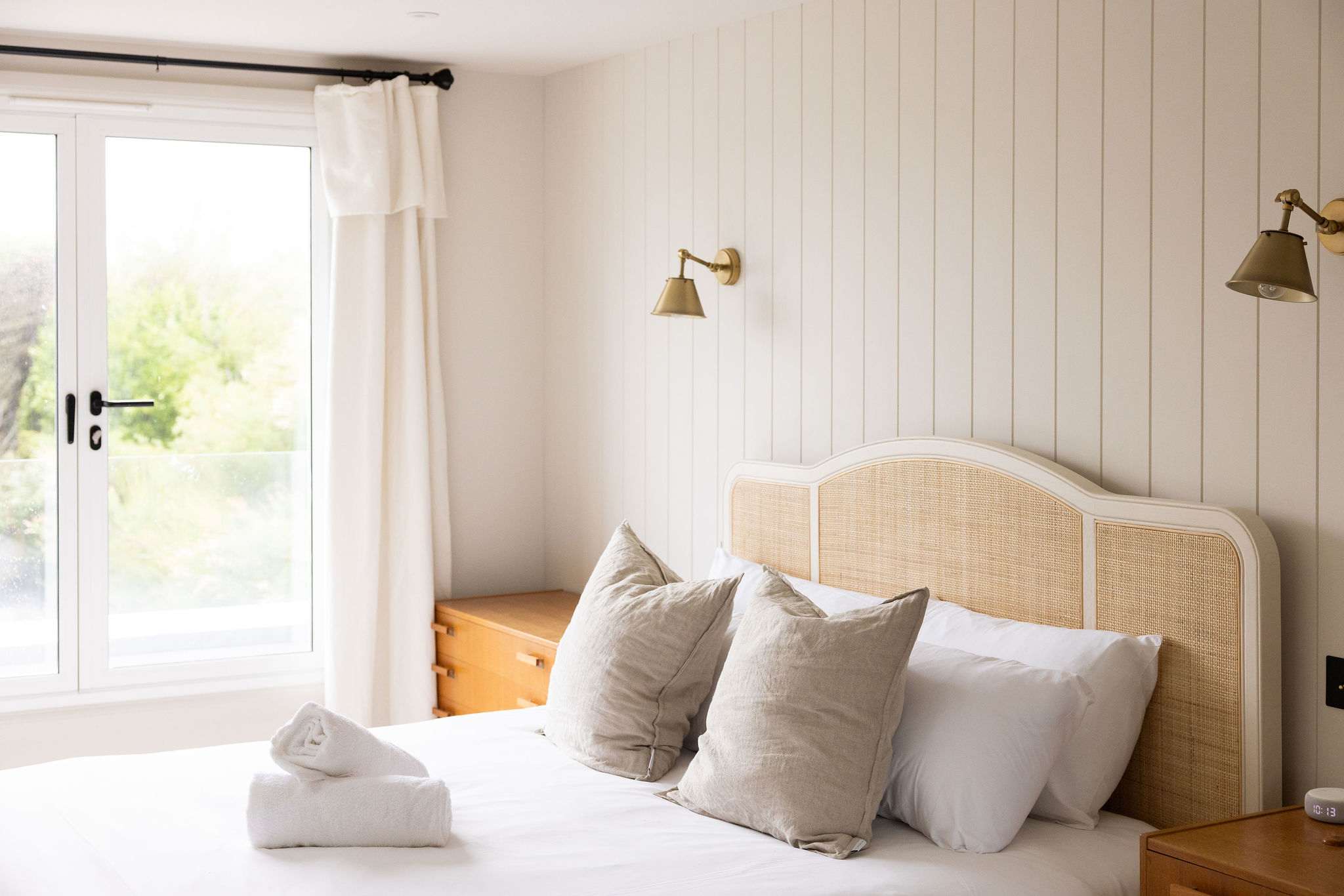 Coastal-inspired interiors offer a calming and relaxing stay by the sea.