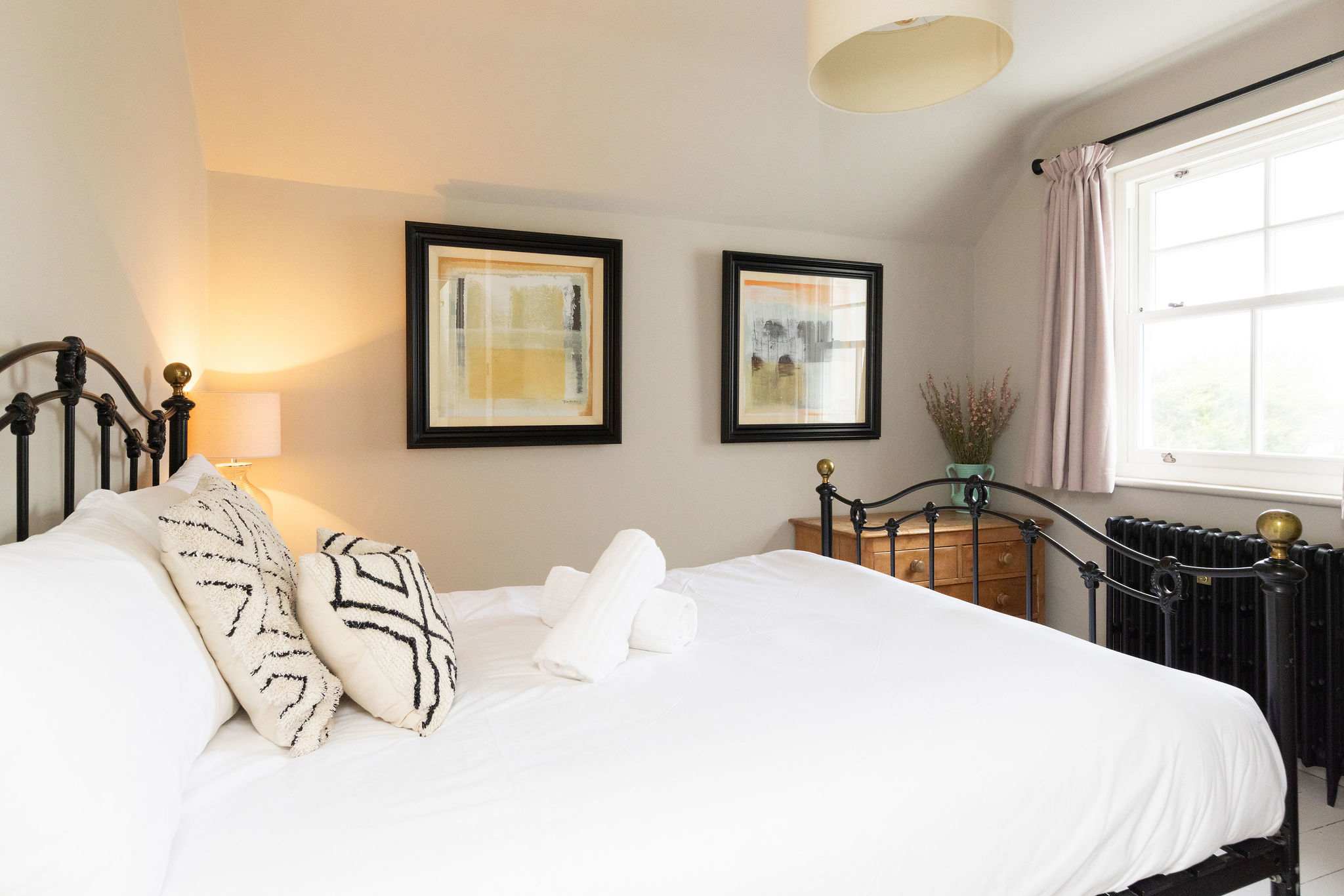 A stylish and comfortable double bedroom, offering a peaceful retreat after a day's adventures.