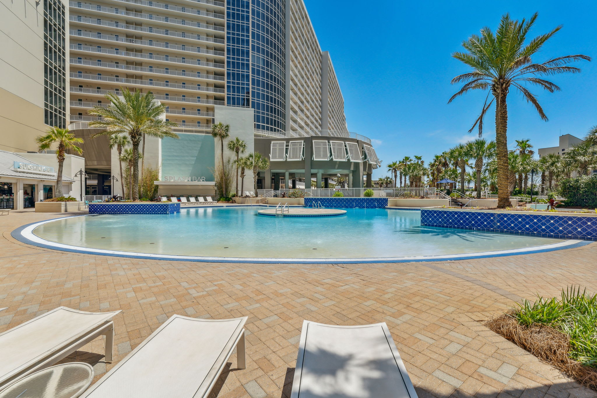 Unwind with a dip or lounge by the sparkling pool