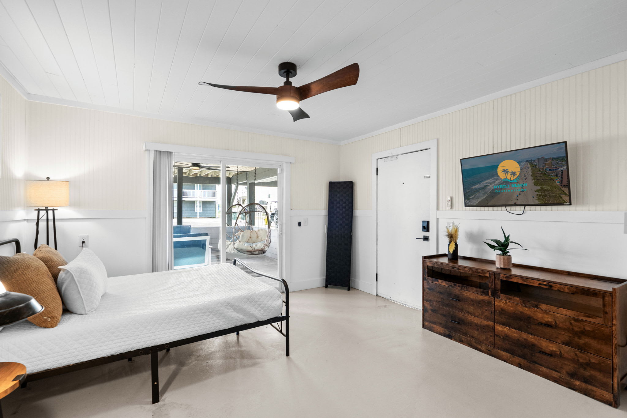 Cozy queen bed with TV