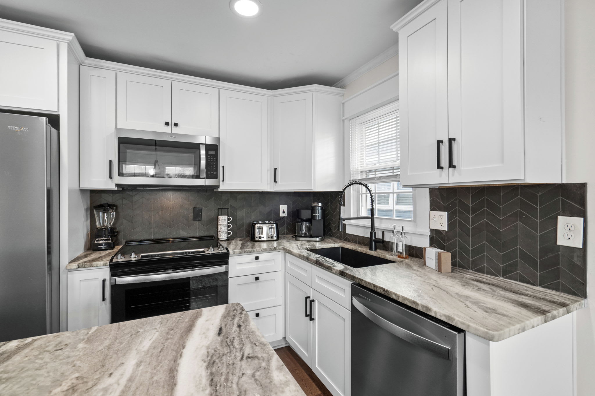 Kitchen featuring essential appliances.