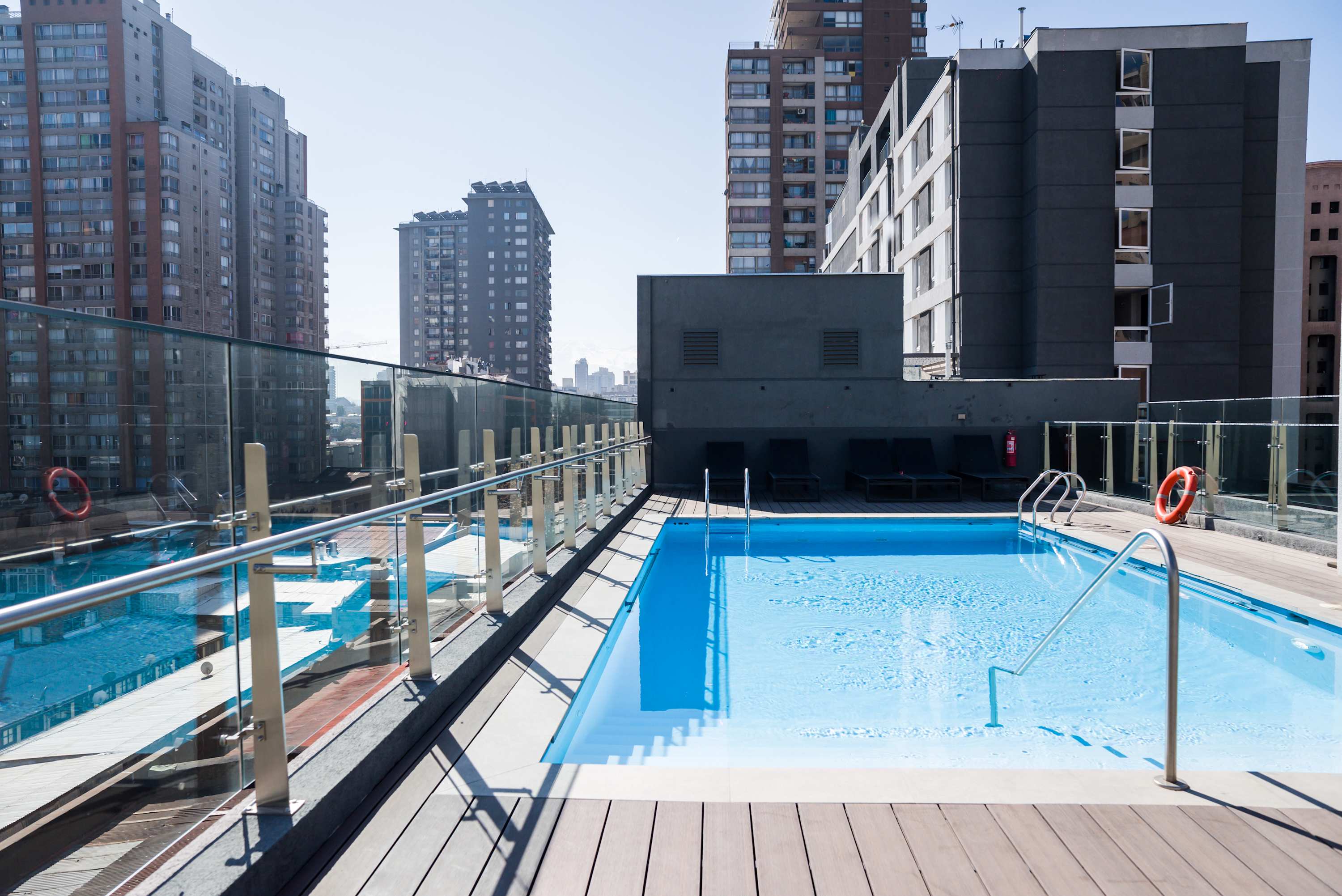 Dive into luxury with a rooftop pool offering panoramic city views. Perfect for relaxation and leisure. (Common Area)