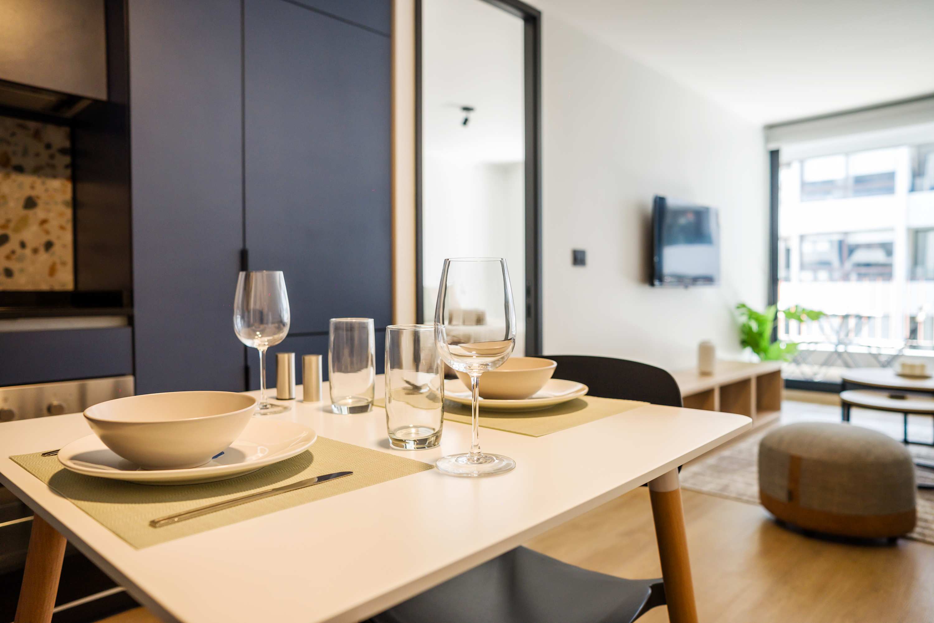 Savor meals in this chic dining space with modern amenities and a bright, inviting ambiance.