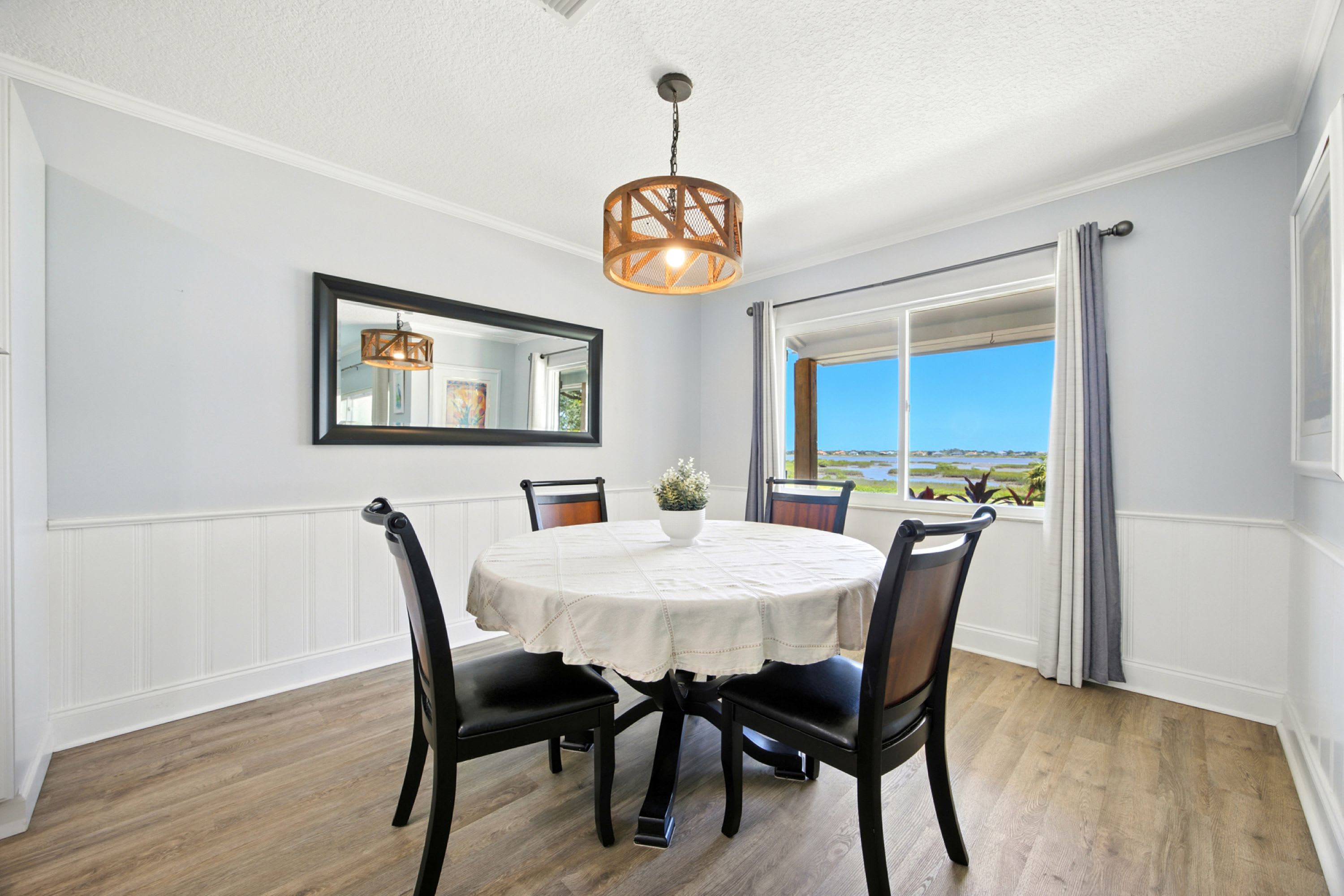 Make mealtime memories together at the dining table, seating 4​