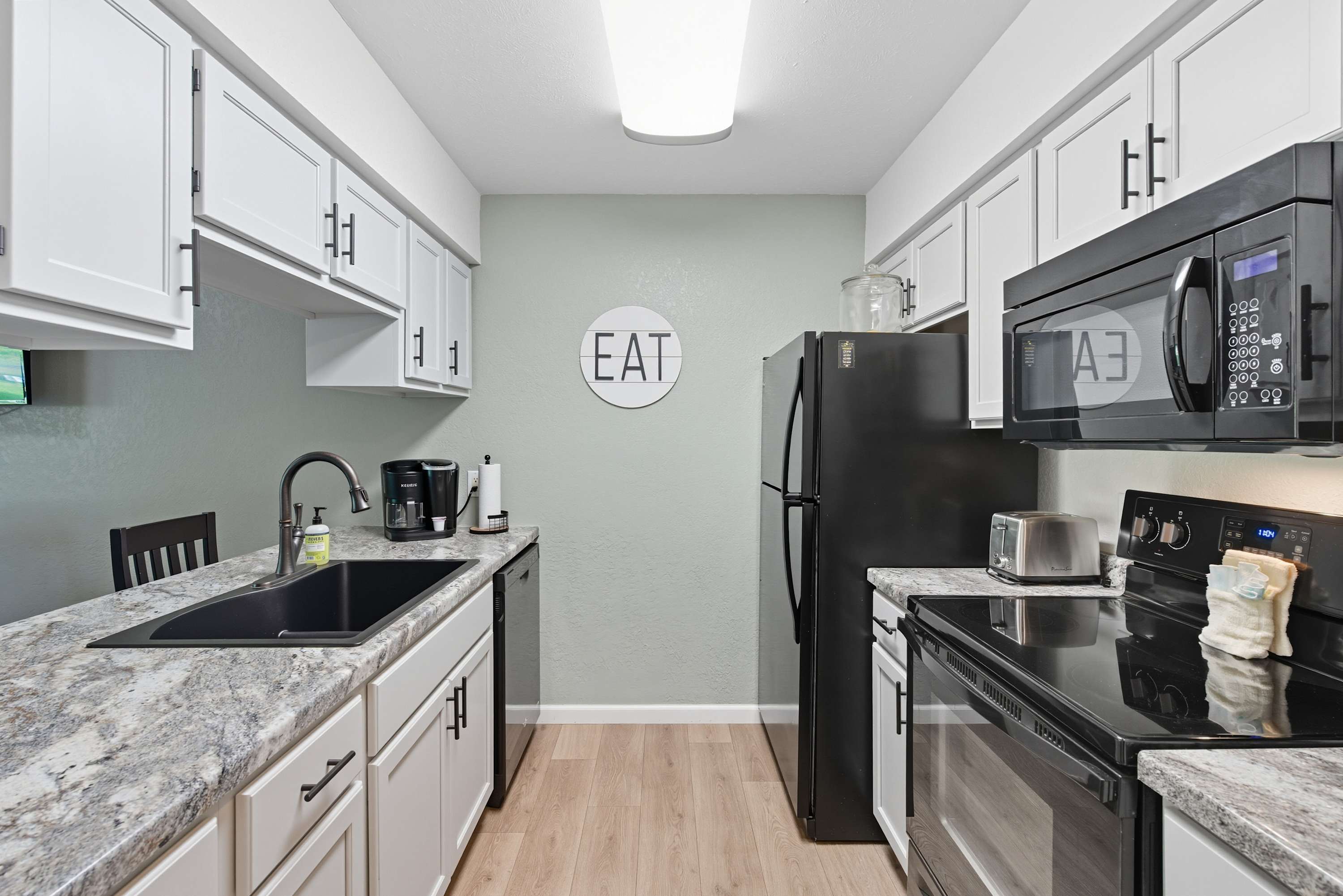 The airy kitchen is well-equipped for an unforgettable getaway​