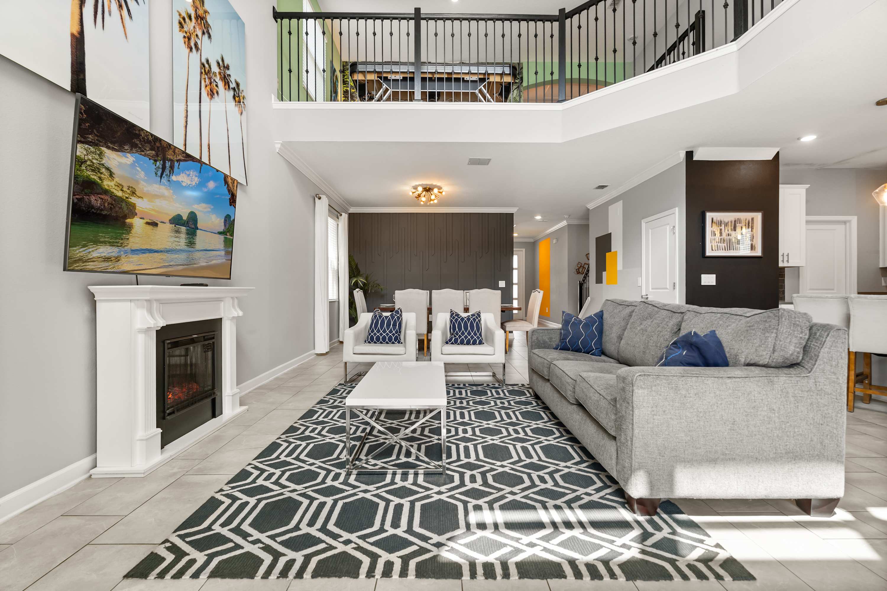 Modern open-plan living room with plush seating and smart TV for family movie nights.