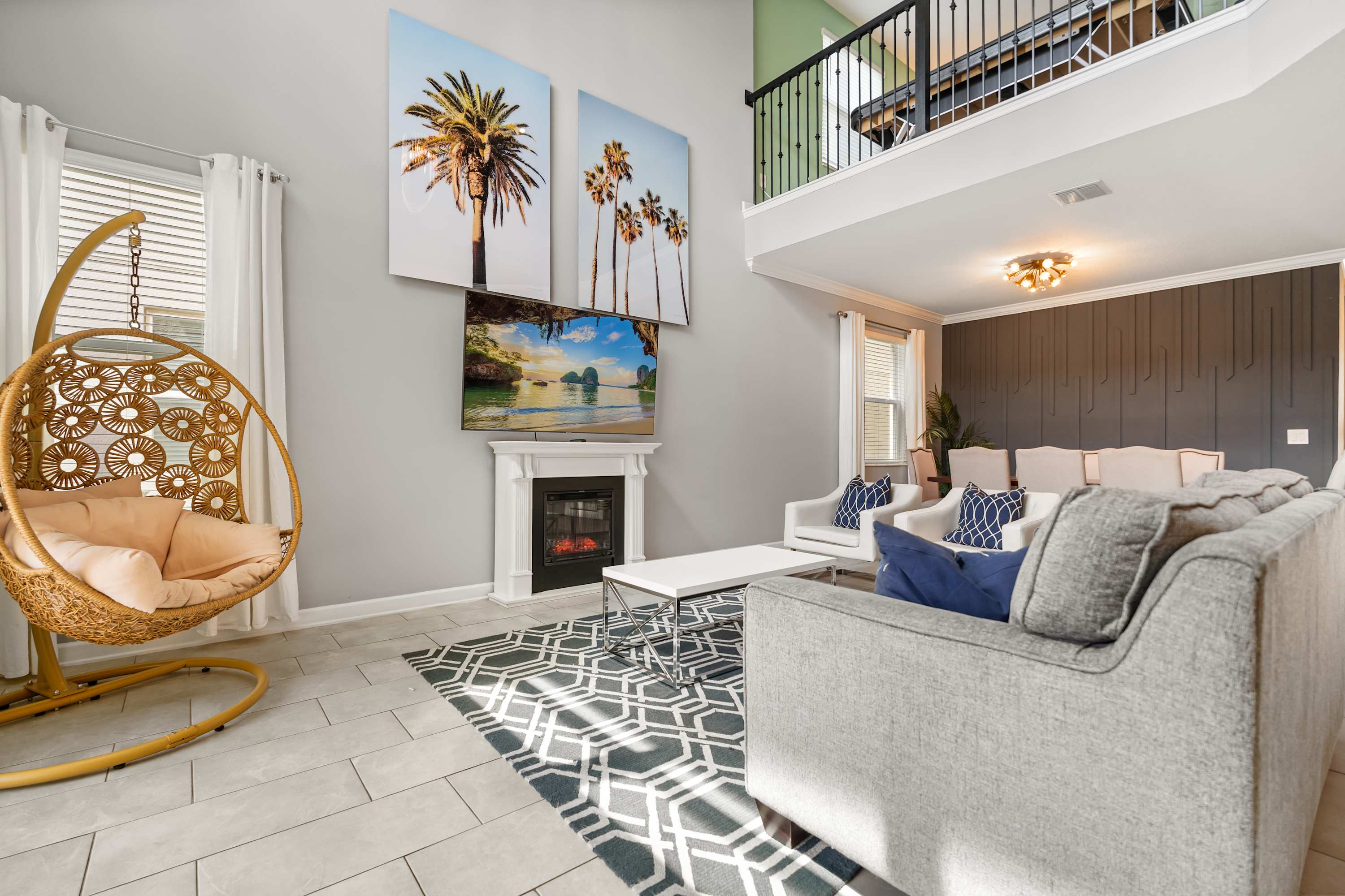 Modern open-plan living room with plush seating and smart TV for family movie nights.