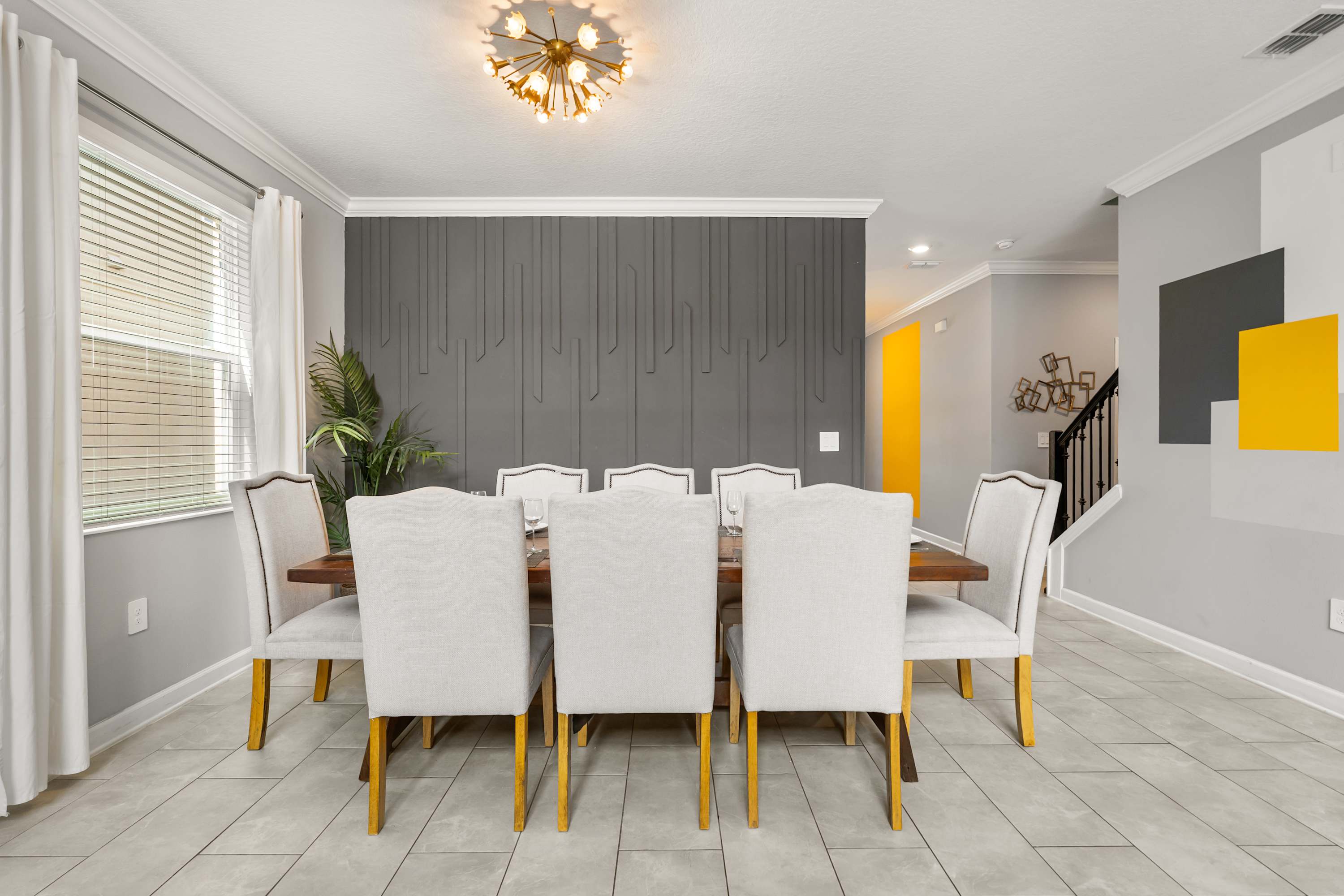 Stylish dining area with seating for the whole group to share meals together.