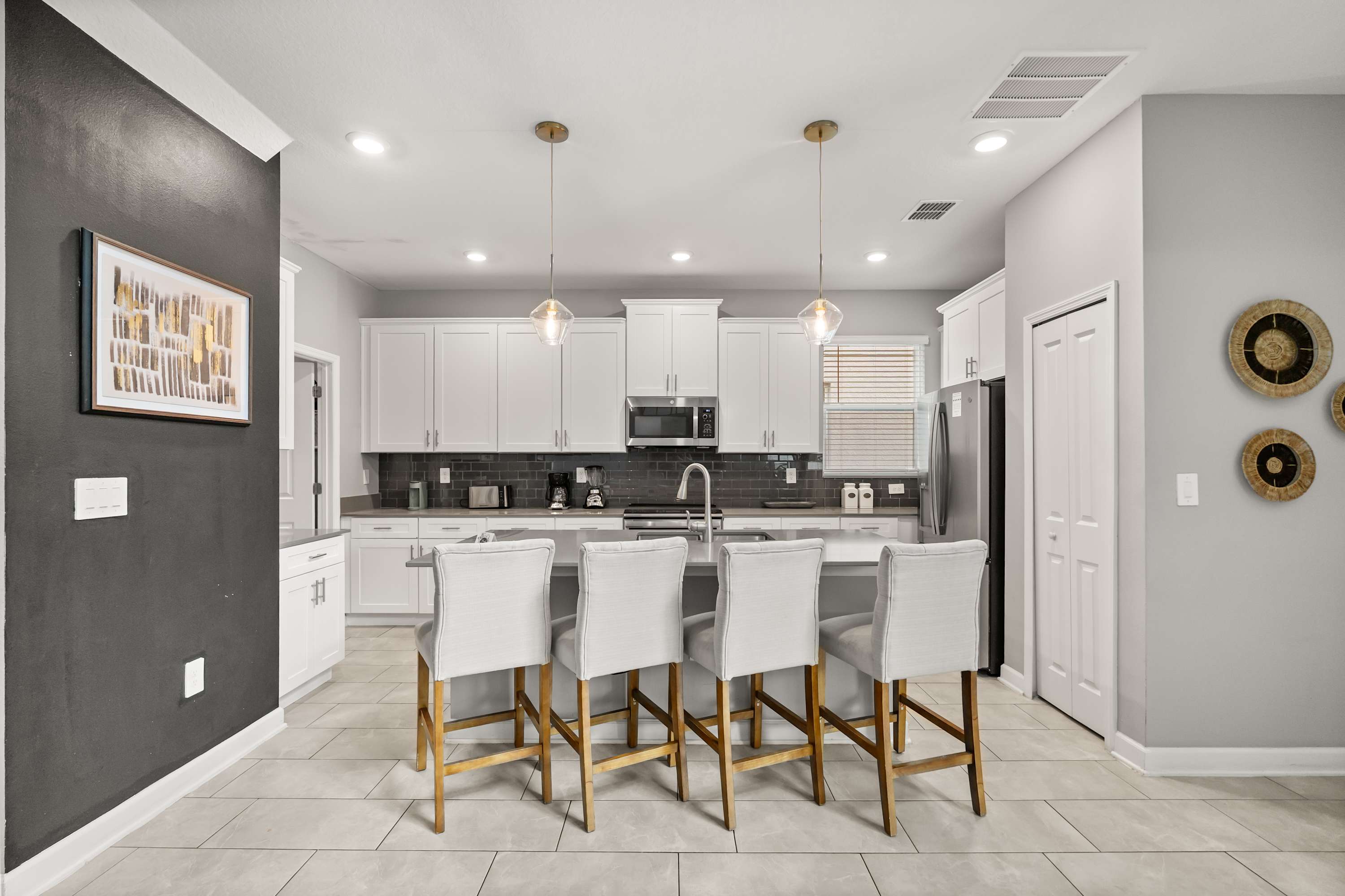 Kitchen island with bar seating — great for casual meals or conversations while cooking.