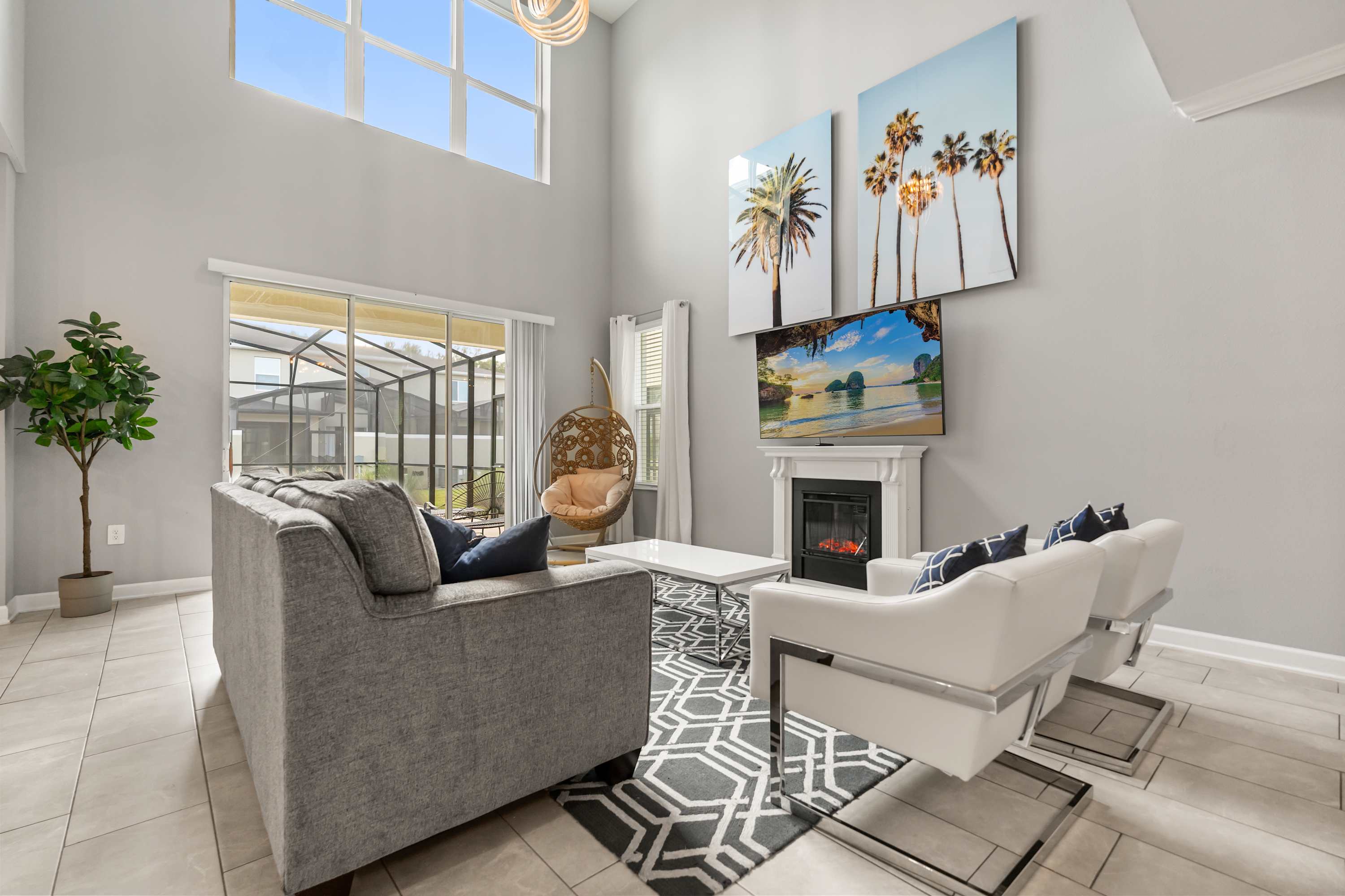 Modern open-plan living room with plush seating and smart TV for family movie nights.