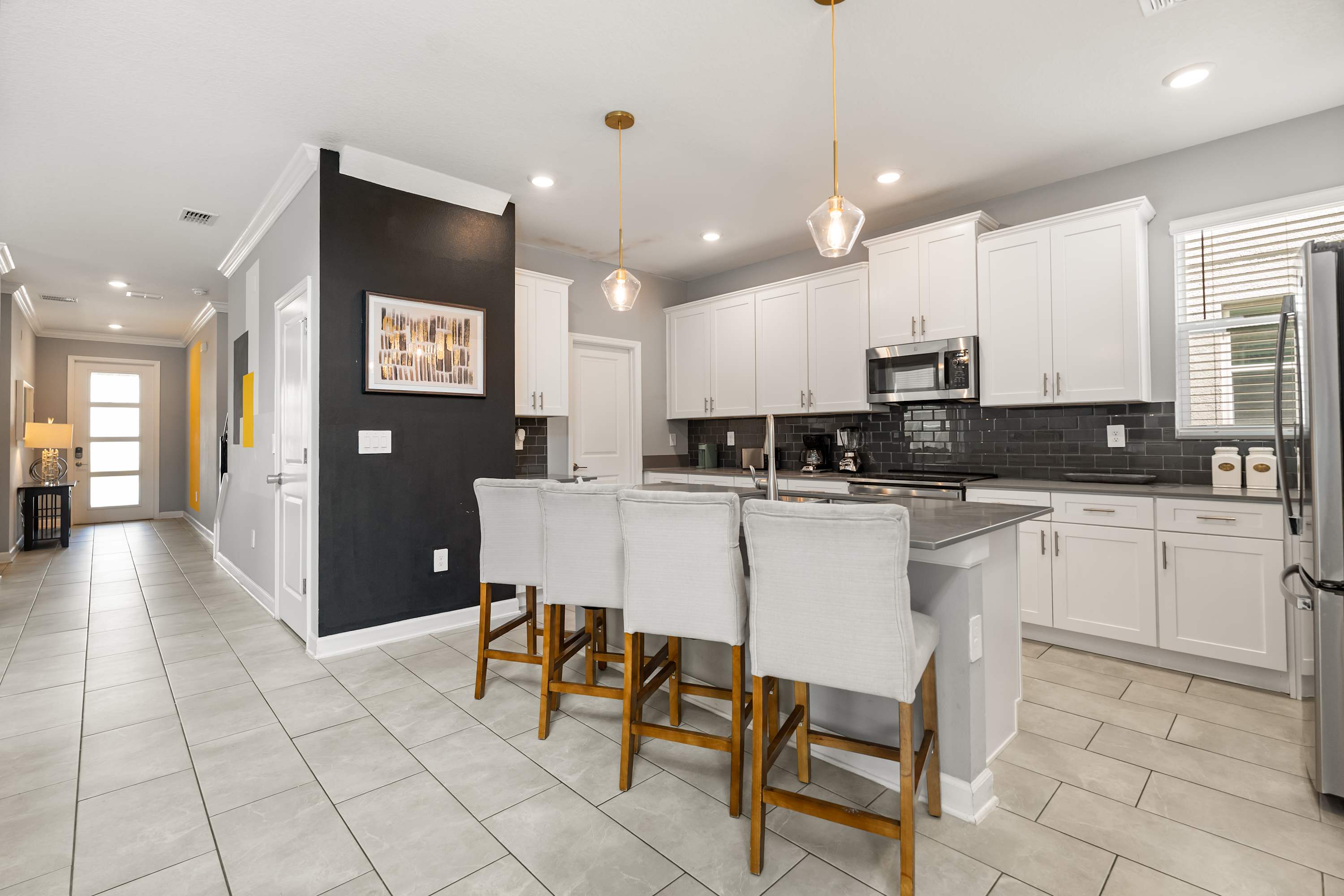 Kitchen island with bar seating — great for casual meals or conversations while cooking.