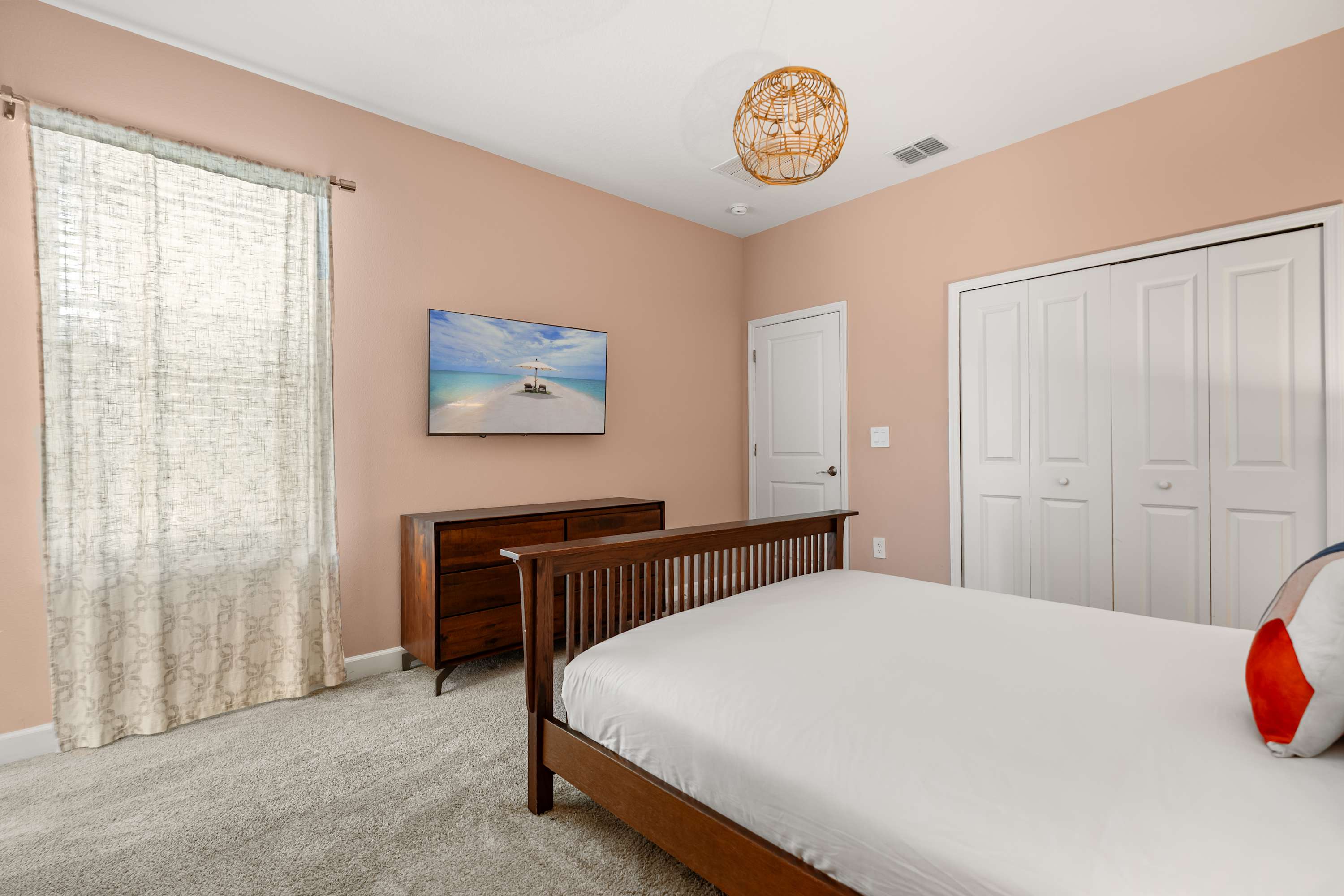 Relax in this cosy bedroom featuring a comfortable double bed, perfect for unwinding after a day of fun.